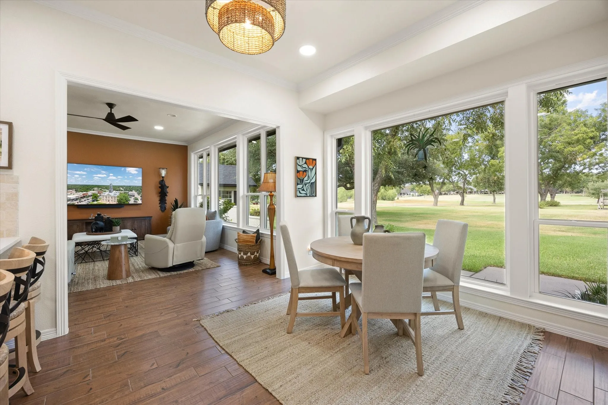 Breakfast Room with Wall of Windows Overlooking Golf Course