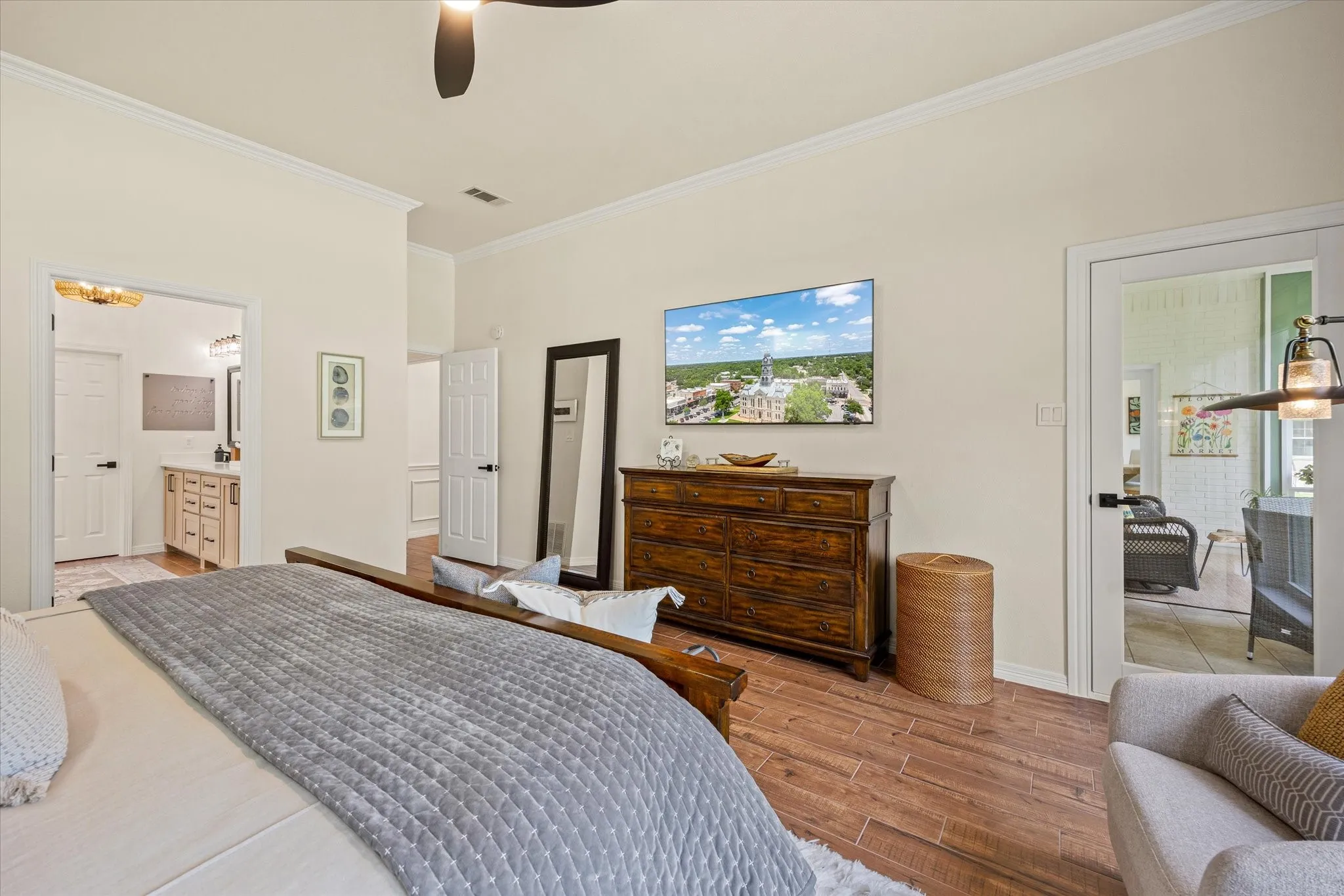 Another View of the Primary Bedroom with Access to Sunroom