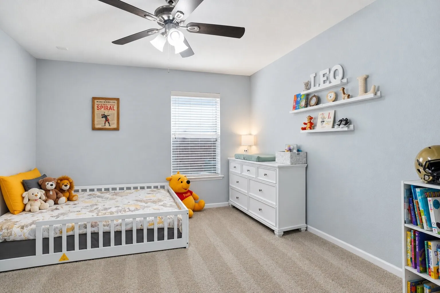 Bright secondary bedroom featuring a vaulted ceiling, comfortable floor space, and ample room for furniture and storage. Photos have been AI enhanced for presentation; no material property features were altered.