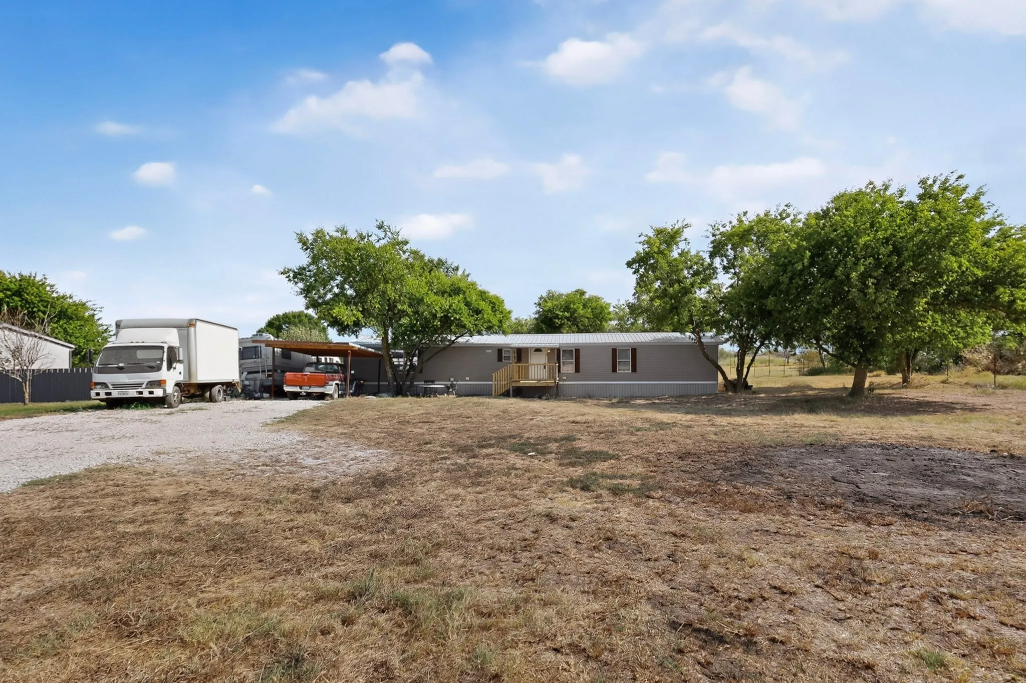Mobile Home For Sale in Johnson County , 8108 Gray Mist Court, Alvarado, Texas 76009, 3 Bedroom, 2 Bathroom, Garage spaces, 1,152 Sqft, built in 2006, mls#21383090, Real Estate Agent in Alvarado, Homes For Sale in Johnson county, Homes For Sale in Alvarado, Realtor in Alvarado Texas, Real Estate Brokerage Independent Realty Texas, Luminita Cordes Realtor