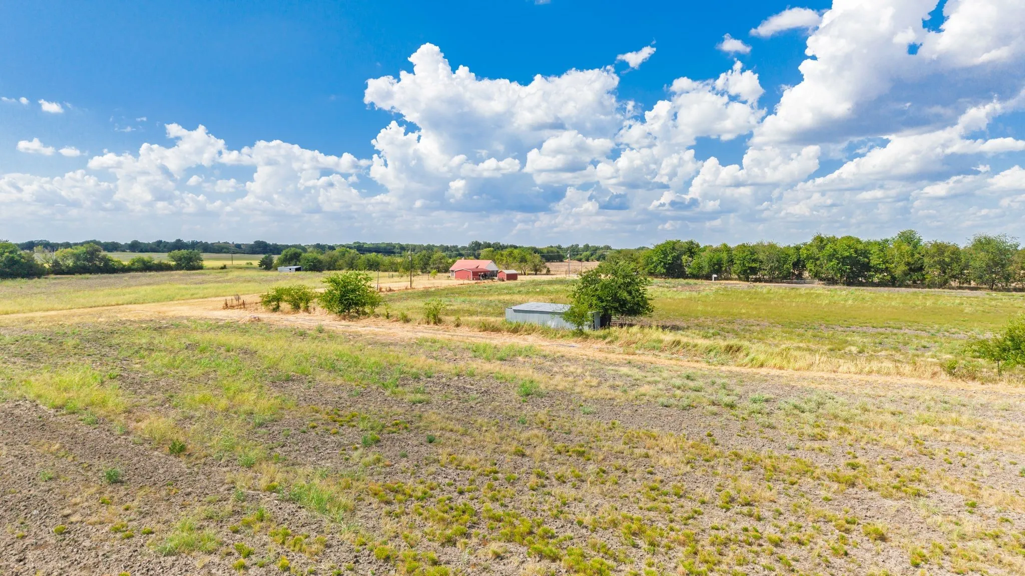 Farm For Sale in Hunt County , 7959 County Road 4823, Wolfe City, Texas 75496, 2 Bedroom, 2 Bathroom, Garage spaces, 1,200 Sqft, built in 2014, mls#21385401, Real Estate Agent in Wolfe City, Homes For Sale in Hunt county, Homes For Sale in Wolfe City, Realtor in Wolfe City Texas, Real Estate Brokerage Independent Realty Texas, Luminita Cordes Realtor