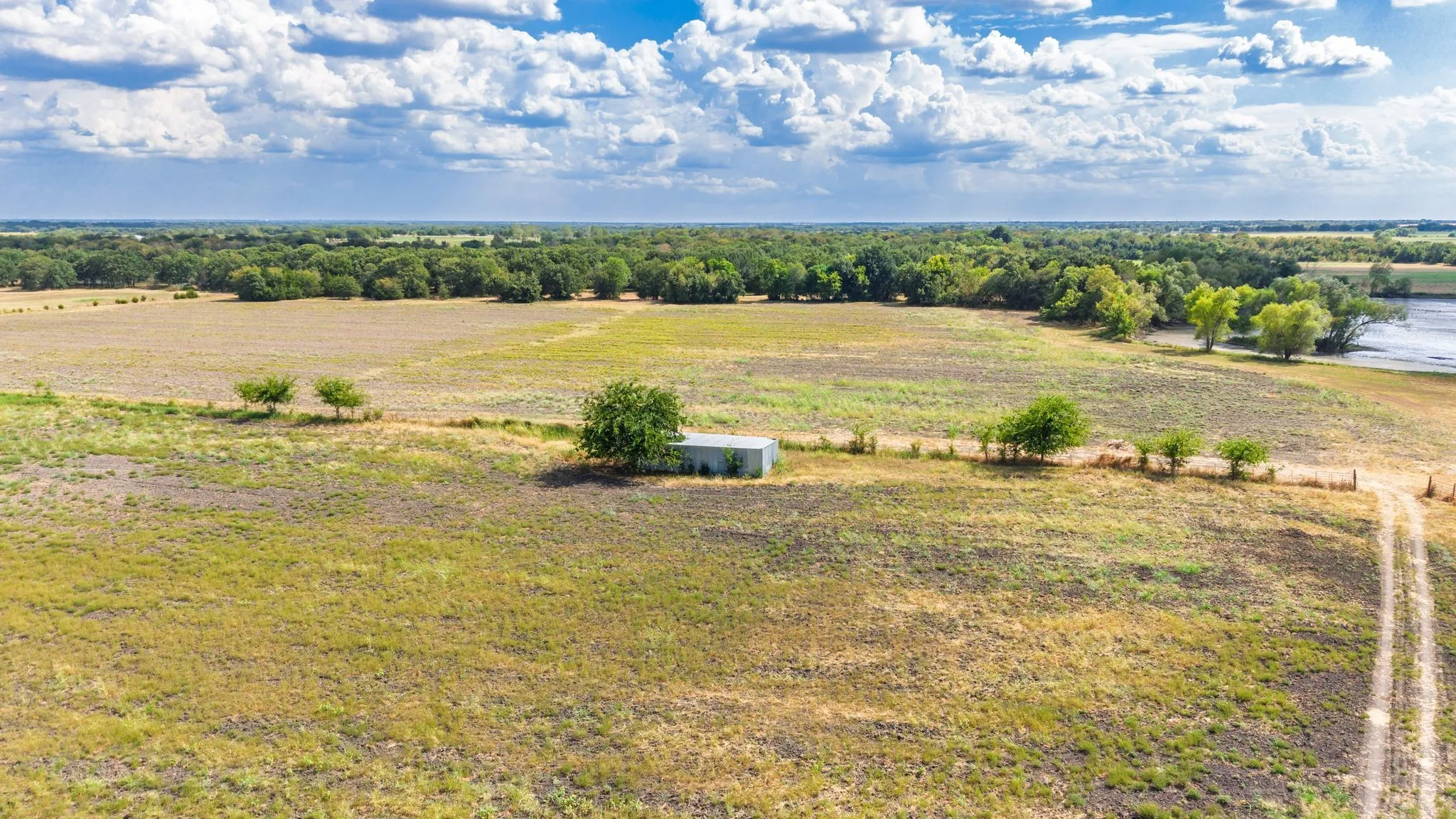 Farm For Sale in Hunt County , 7959 County Road 4823, Wolfe City, Texas 75496, 2 Bedroom, 2 Bathroom, Garage spaces, 1,200 Sqft, built in 2014, mls#21385401, Real Estate Agent in Wolfe City, Homes For Sale in Hunt county, Homes For Sale in Wolfe City, Realtor in Wolfe City Texas, Real Estate Brokerage Independent Realty Texas, Luminita Cordes Realtor