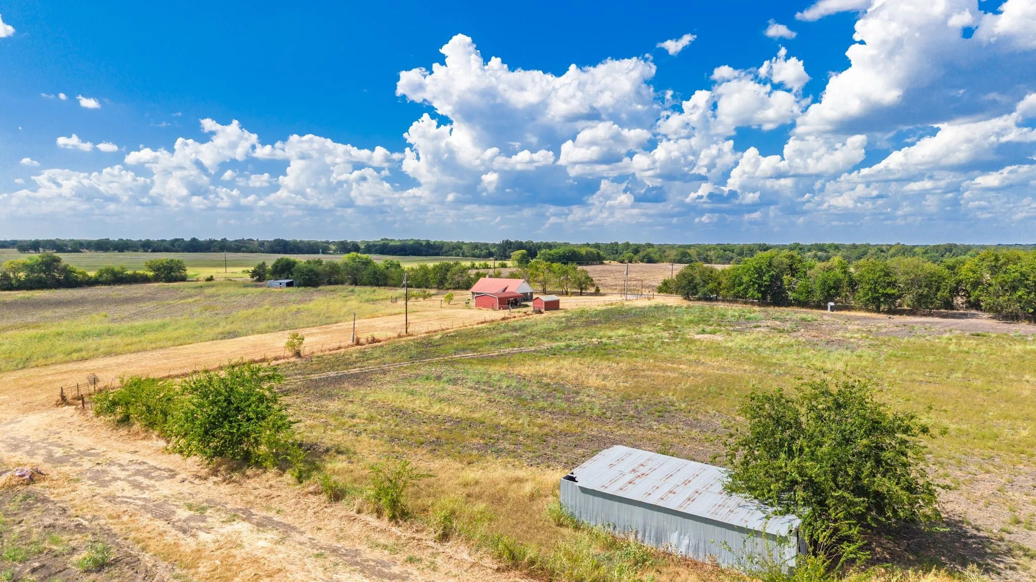 Farm For Sale in Hunt County , 7959 County Road 4823, Wolfe City, Texas 75496, 2 Bedroom, 2 Bathroom, Garage spaces, 1,200 Sqft, built in 2014, mls#21385401, Real Estate Agent in Wolfe City, Homes For Sale in Hunt county, Homes For Sale in Wolfe City, Realtor in Wolfe City Texas, Real Estate Brokerage Independent Realty Texas, Luminita Cordes Realtor