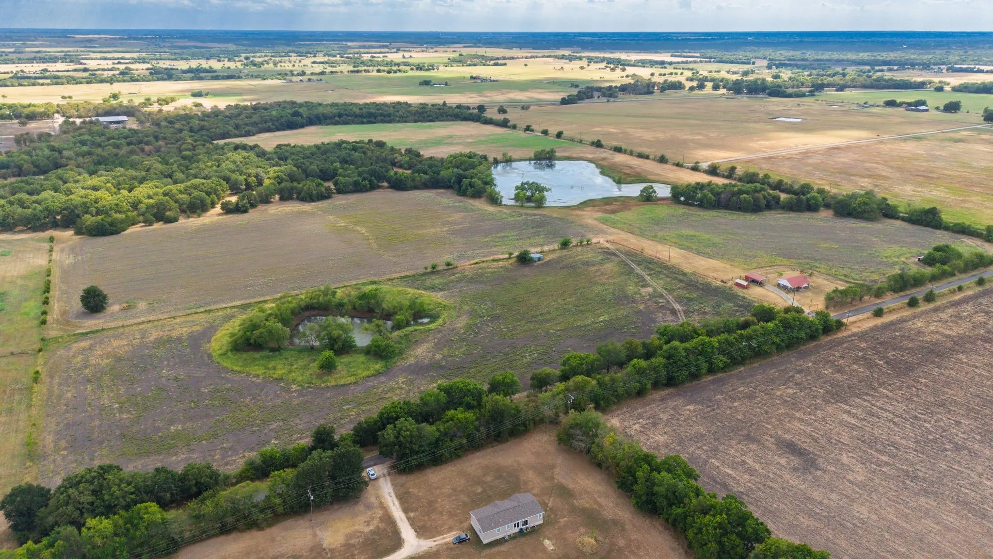 Farm For Sale in Hunt County , 7959 County Road 4823, Wolfe City, Texas 75496, 2 Bedroom, 2 Bathroom, Garage spaces, 1,200 Sqft, built in 2014, mls#21385401, Real Estate Agent in Wolfe City, Homes For Sale in Hunt county, Homes For Sale in Wolfe City, Realtor in Wolfe City Texas, Real Estate Brokerage Independent Realty Texas, Luminita Cordes Realtor