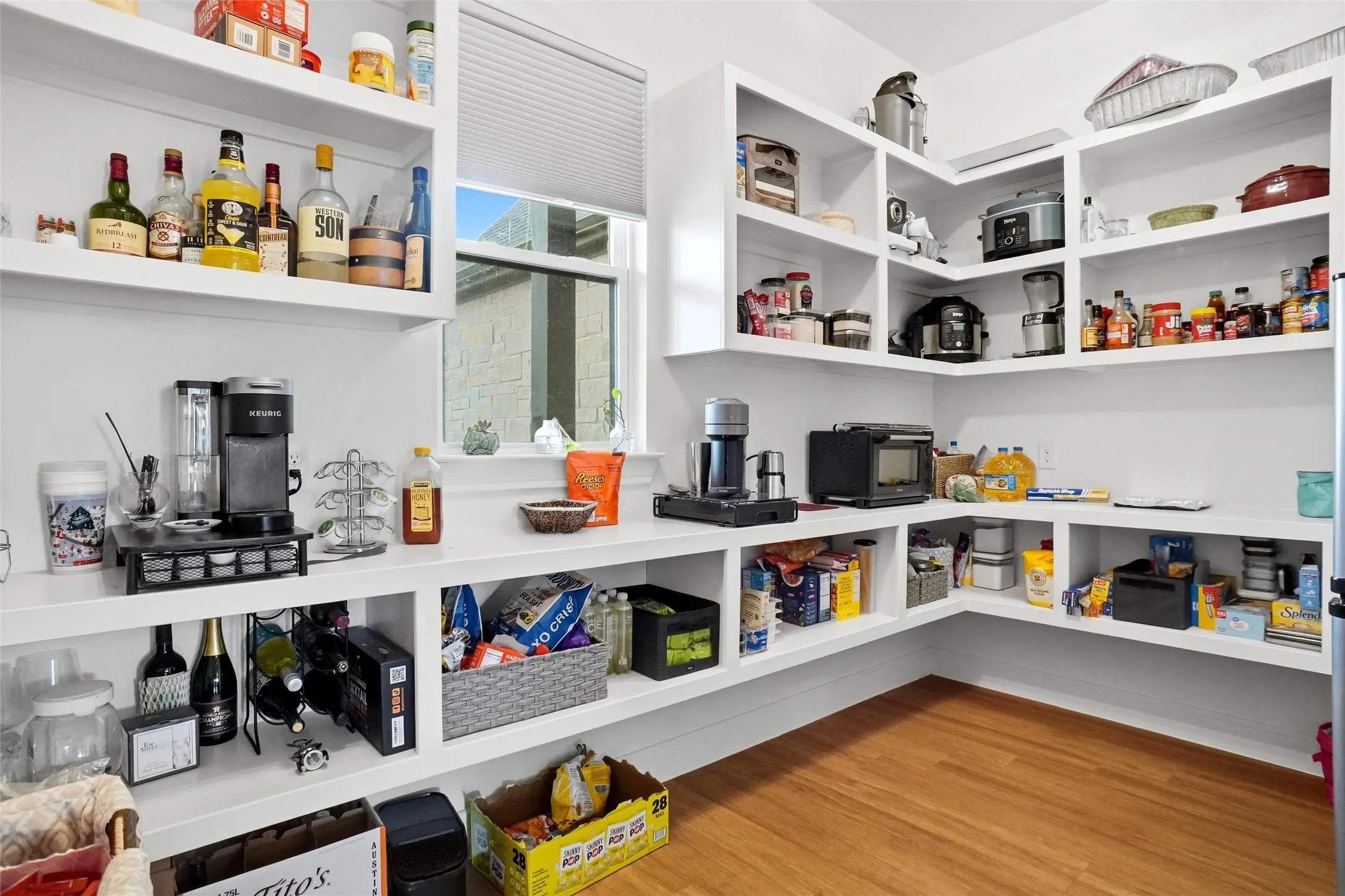 Huge walk in pantry with room for a freezer, coffer bar and more!