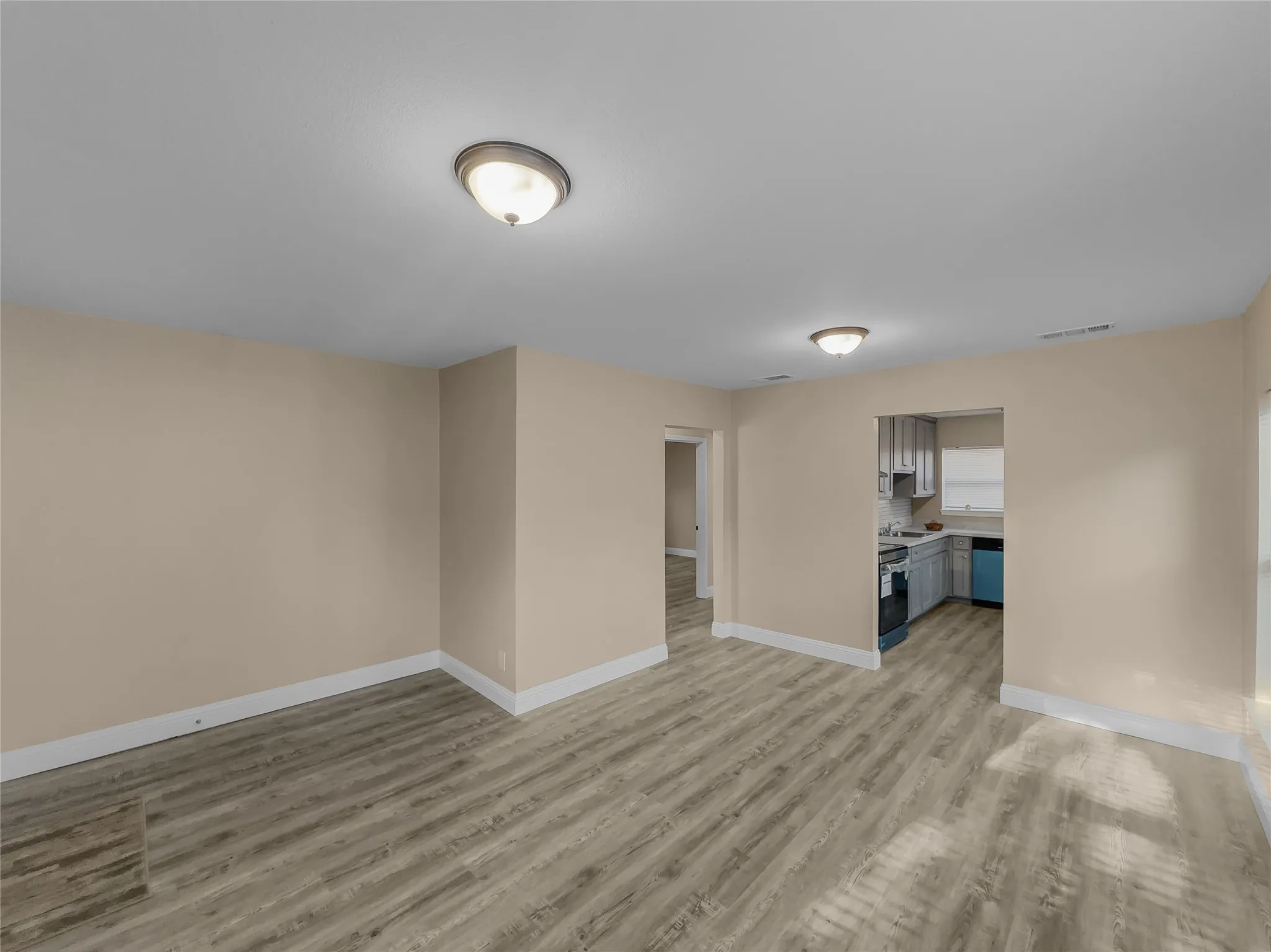 Wood-finish flooring throughout