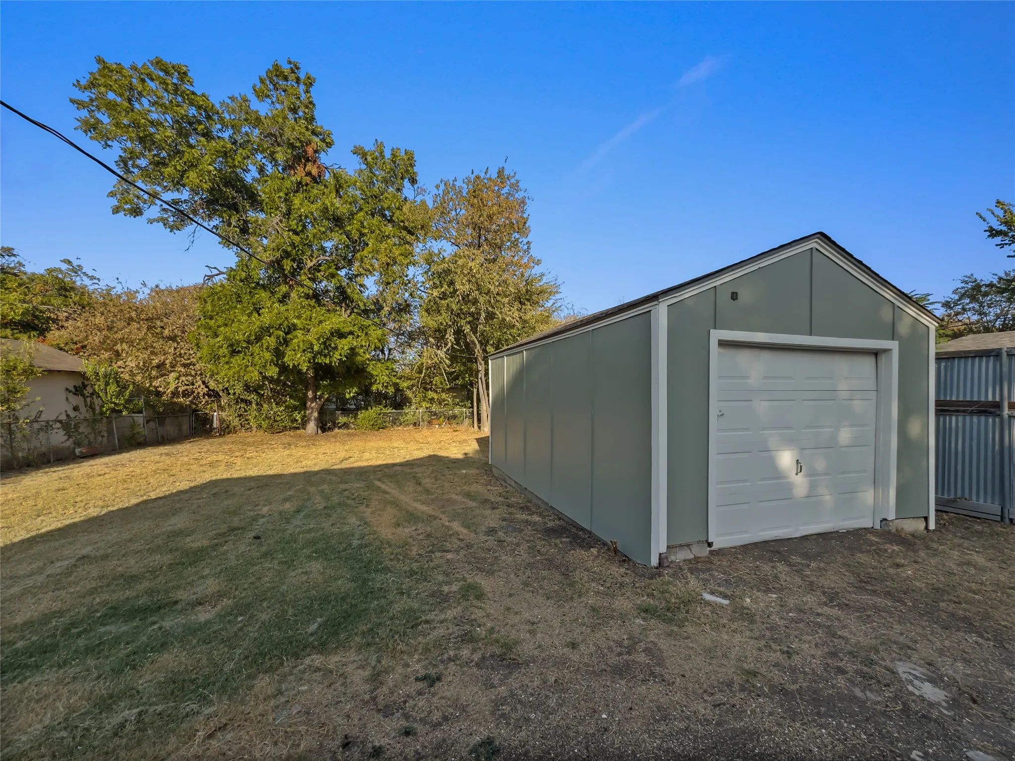 Detached garage with a paneled door