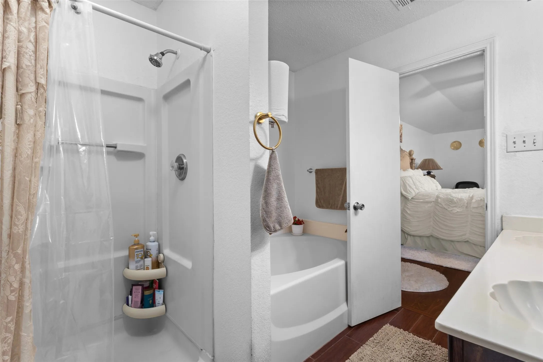 White shower with chrome fixtures
