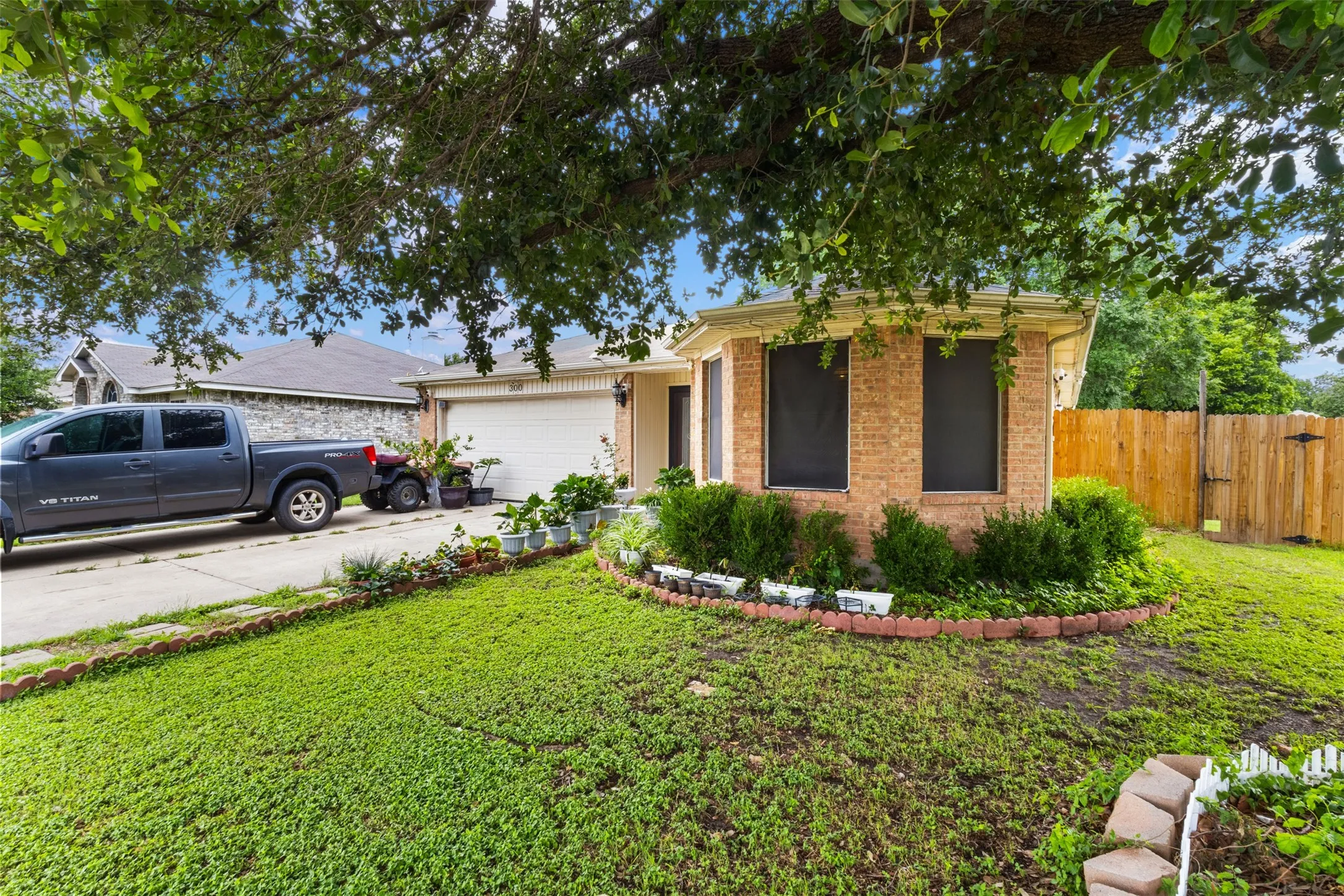 Brick exterior with a two-car garage