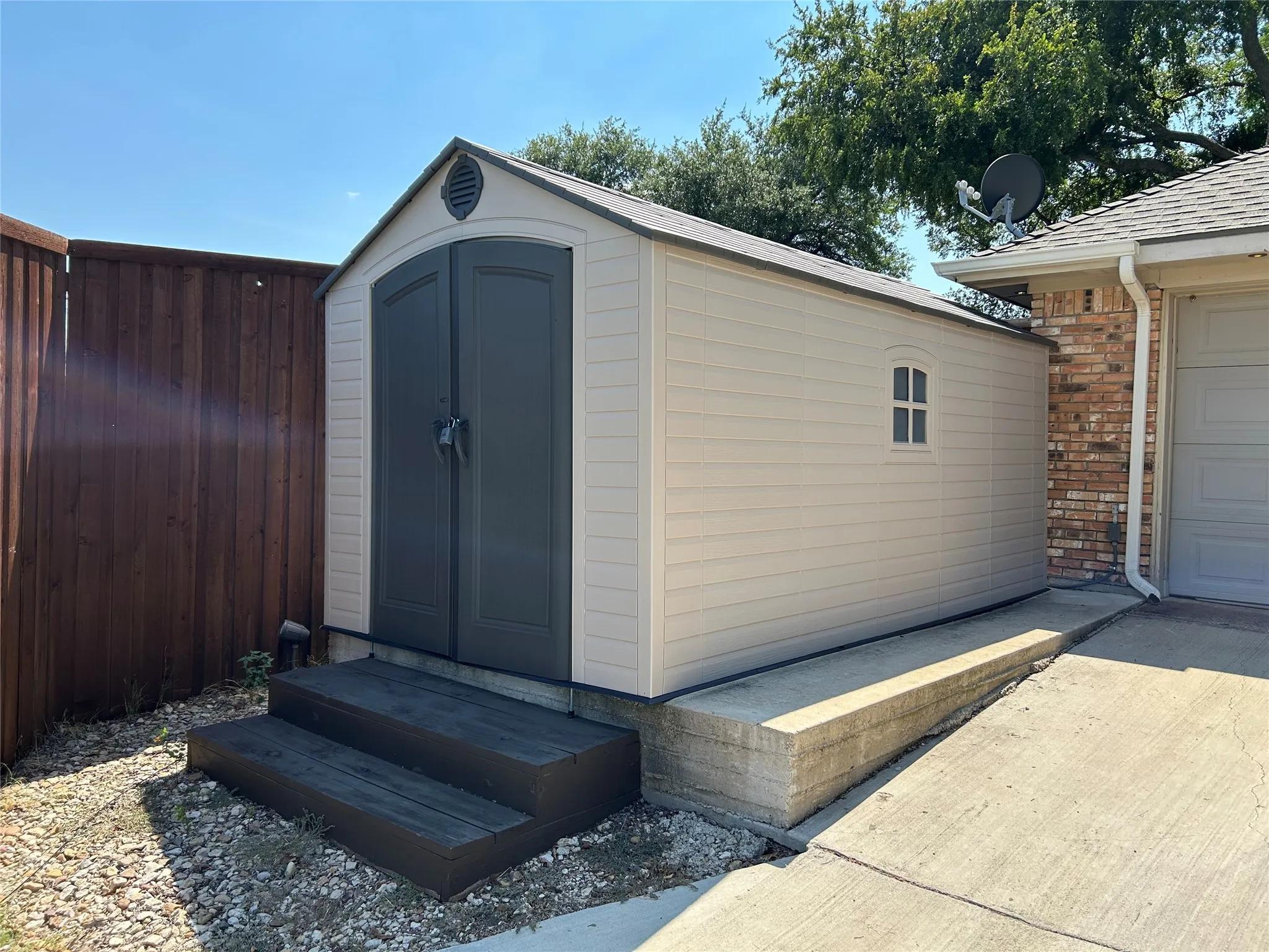 A large 10x15 storage building on a concrete pad keeps all of your tools and equipment secure and organized.