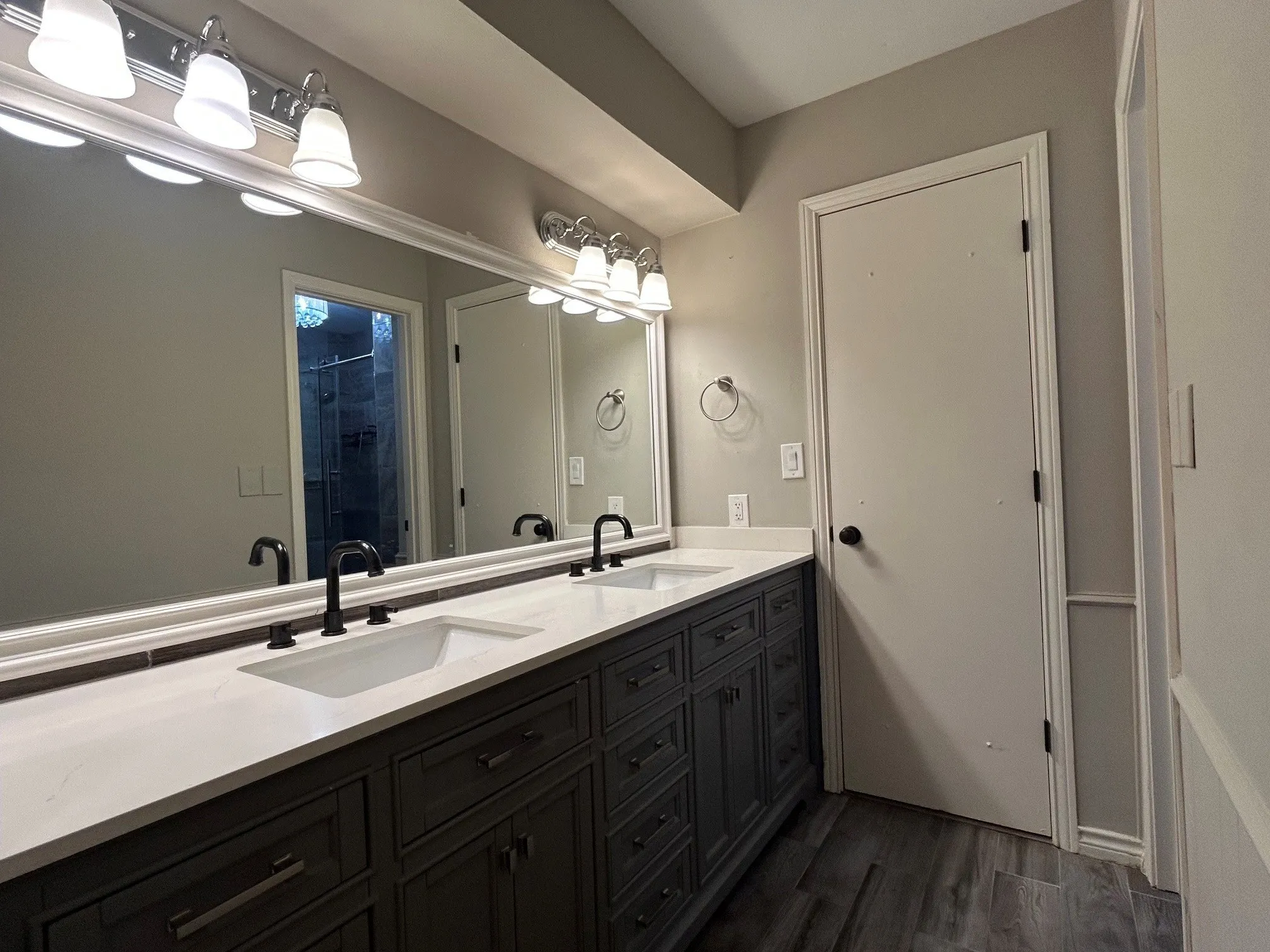 The primary bathroom boasts a new vanity with dual sinks and plenty of cabinet space.  There is also a walk-in closet.