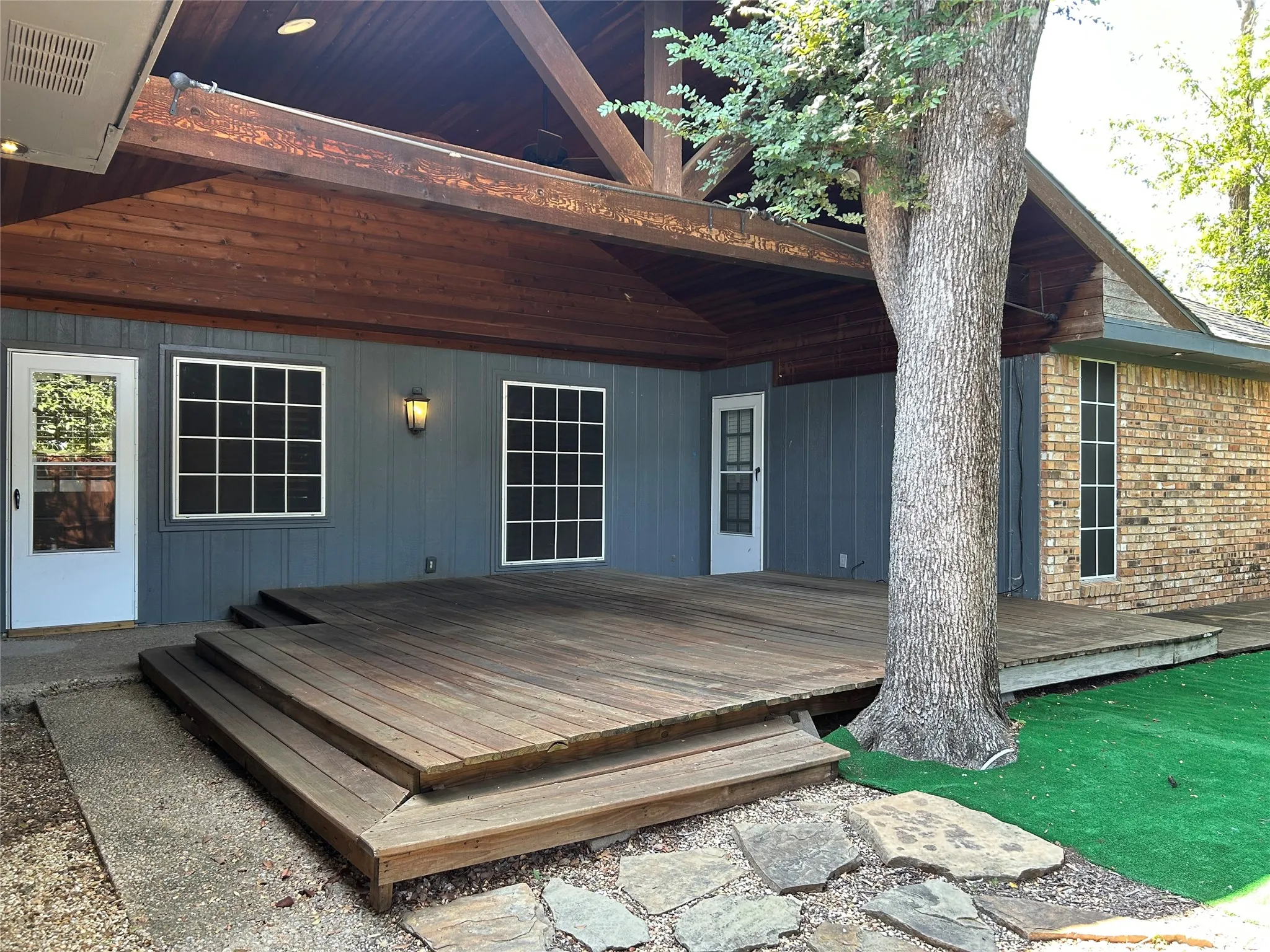 The deck and yard can be accessed from the family room and primary bedroom.