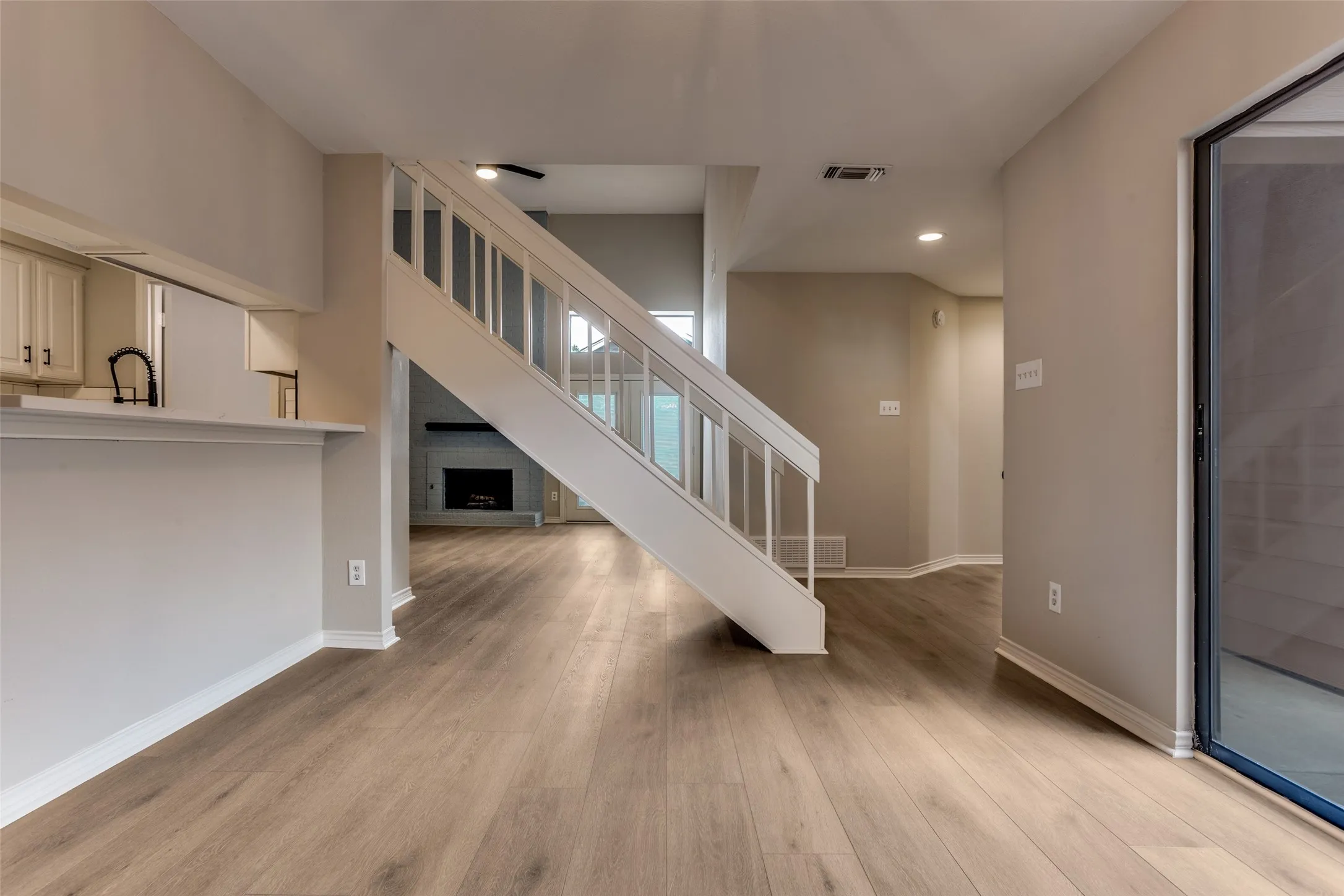 Wood-finish flooring throughout the main level