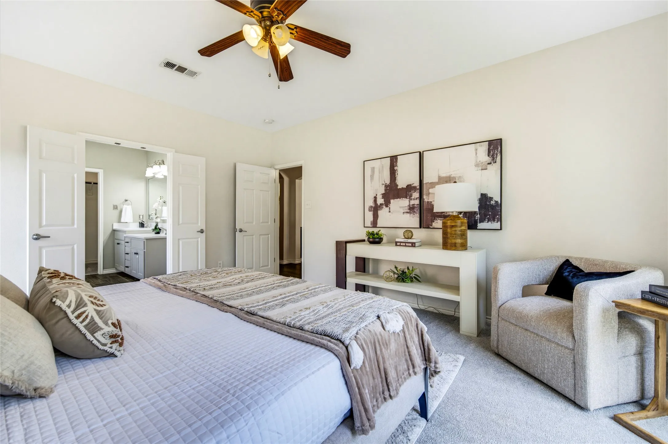 Room for a king bed plus a sitting area, with the primary retreat set apart from the upstairs bedrooms for true separation.