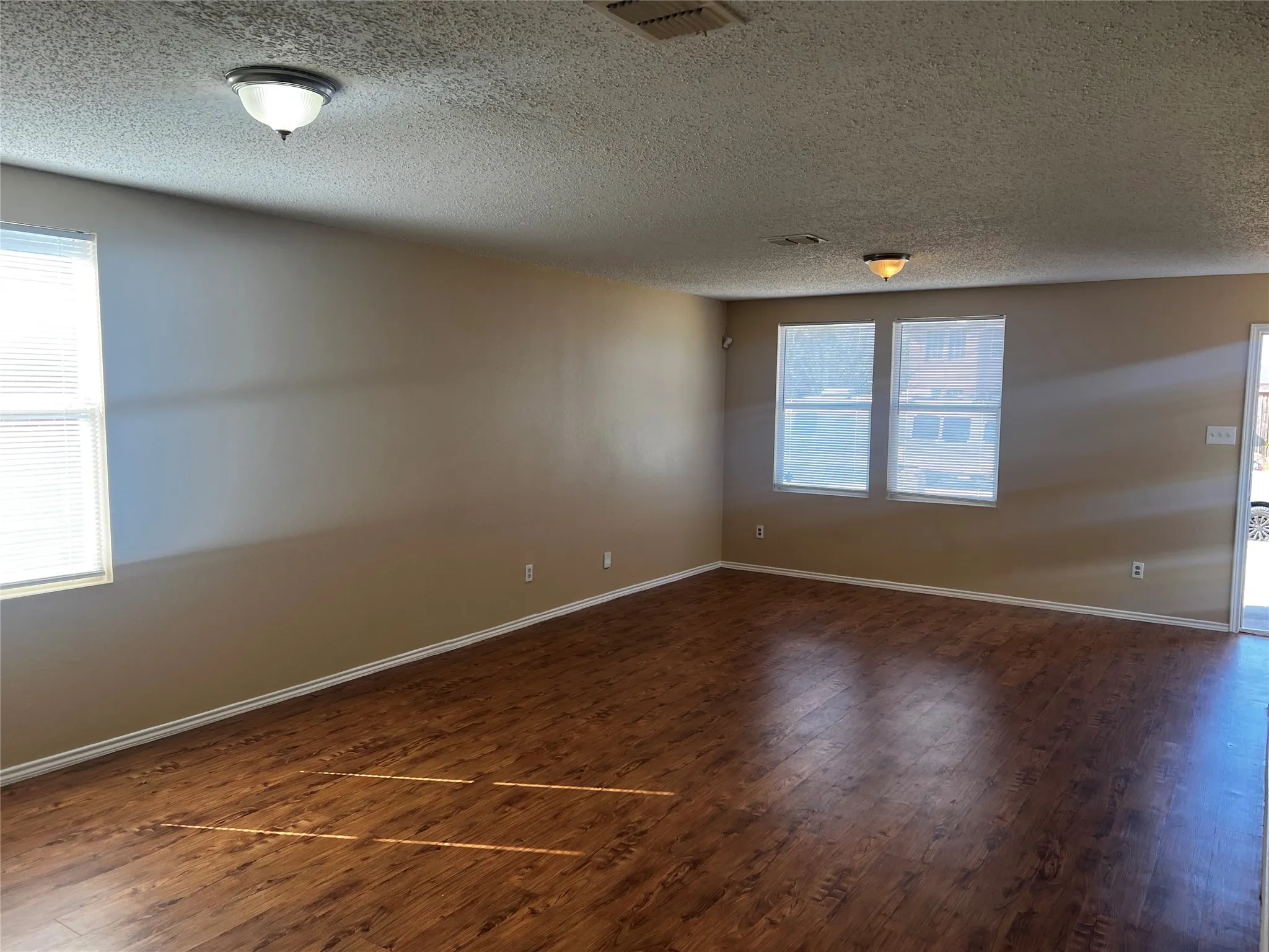 Large living room and formal dining room area.