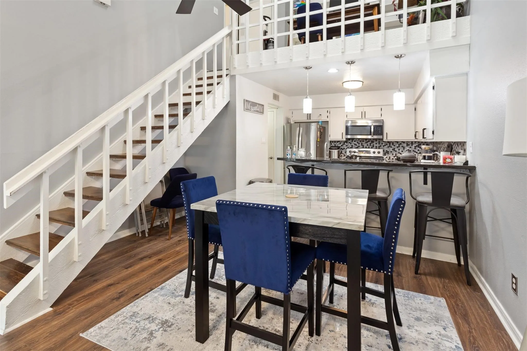 Wood-finish flooring throughout the main level