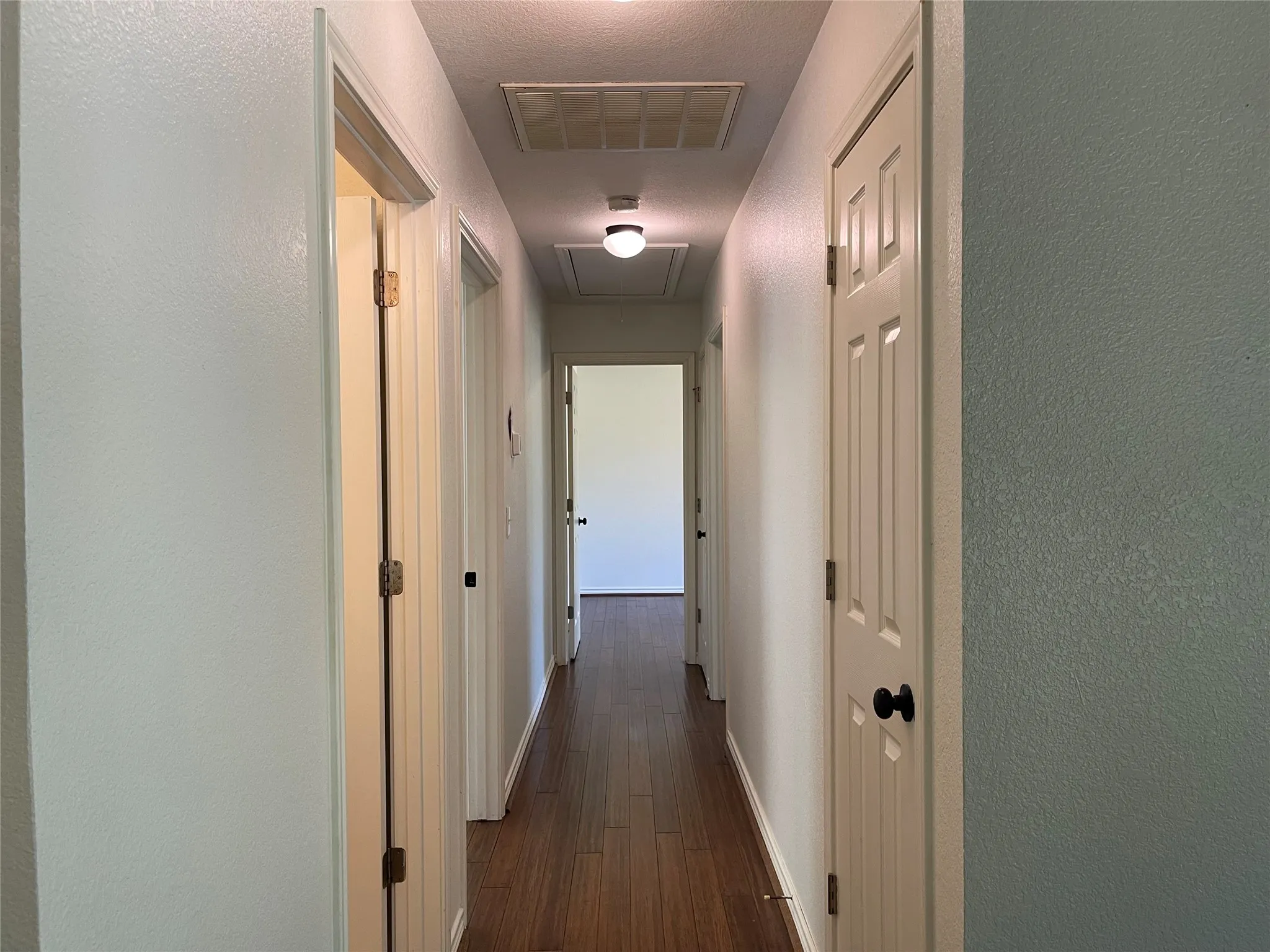 Bedrooms off a central hall.