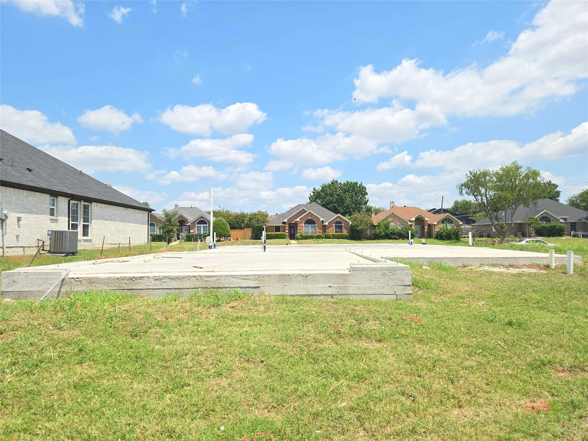 Concrete foundation with plumbing rough-ins