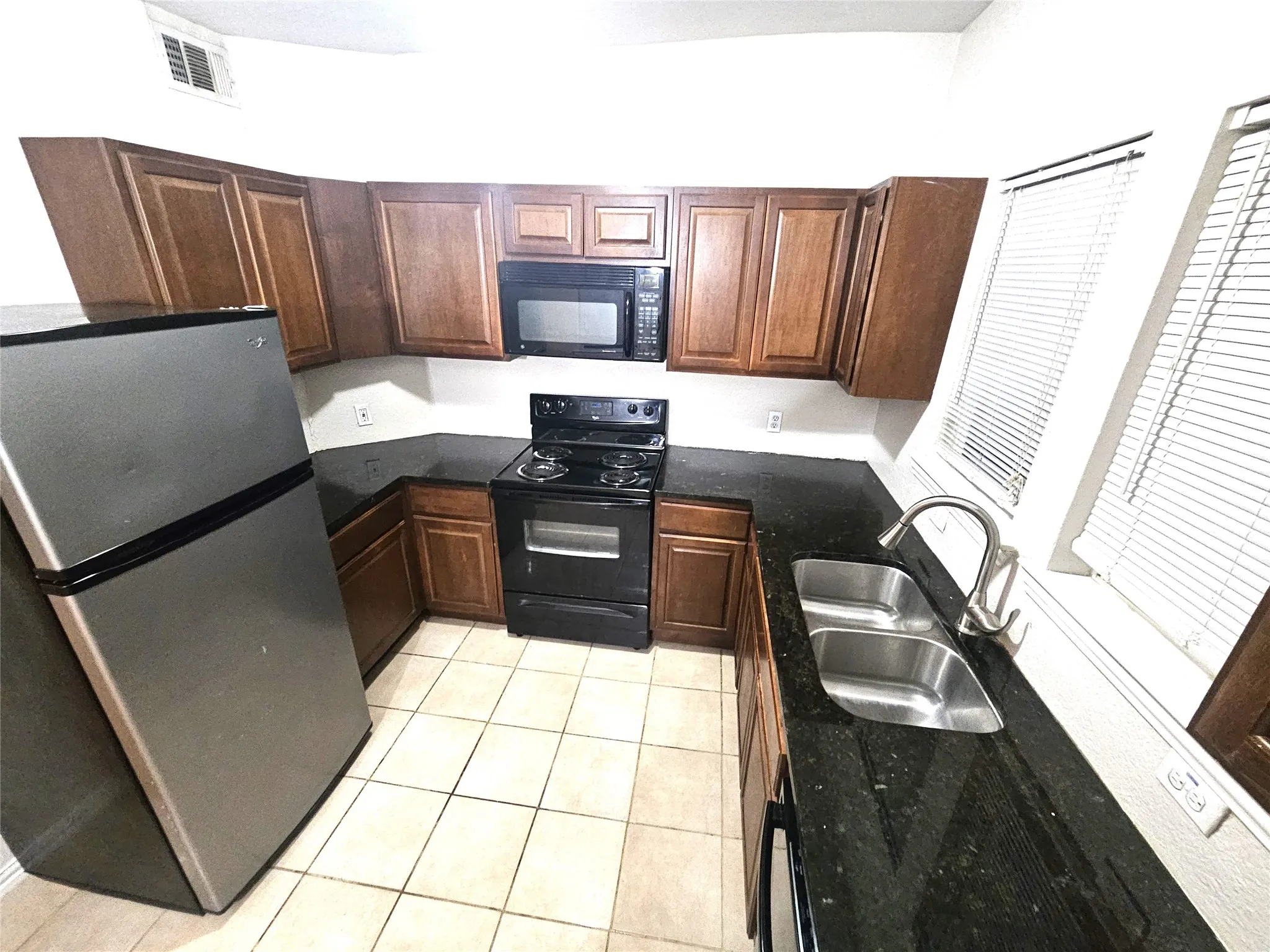 Kitchen with granite countertop
