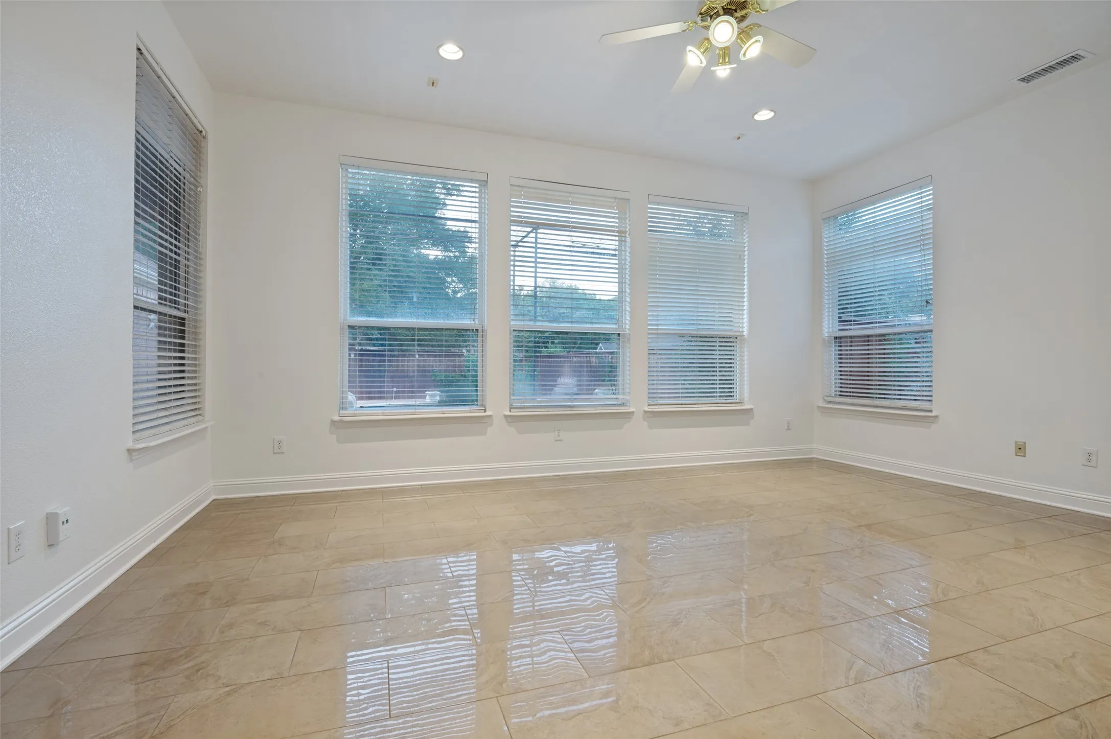 Bedroom or office on first floor with door to patio
