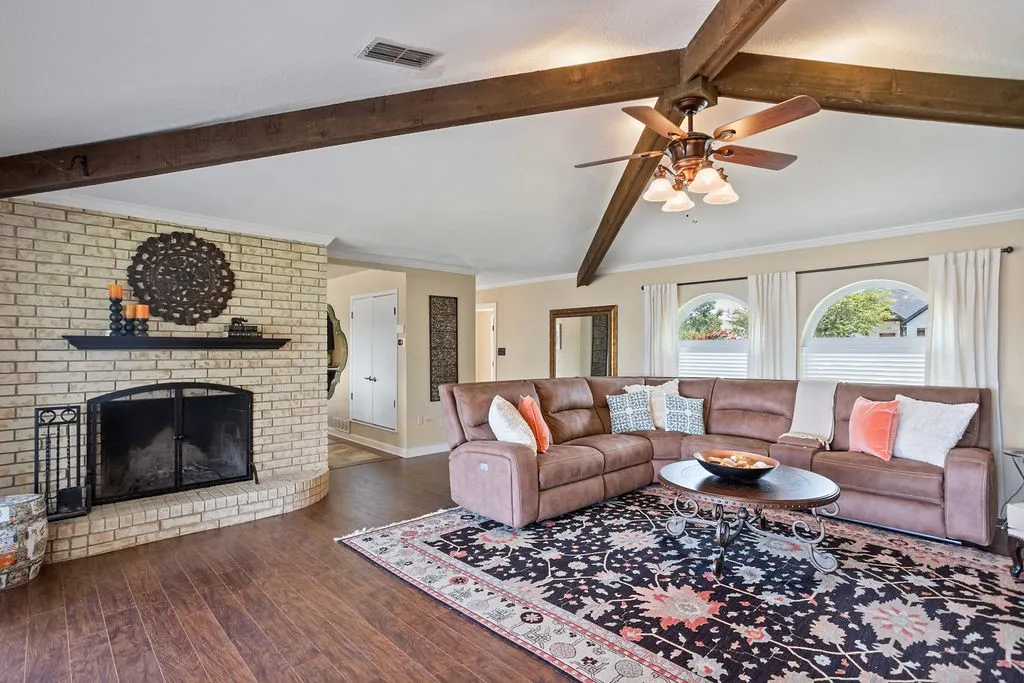 
Enjoy a wood burning fireplace, living area facing the lake and adjacent to kitchen