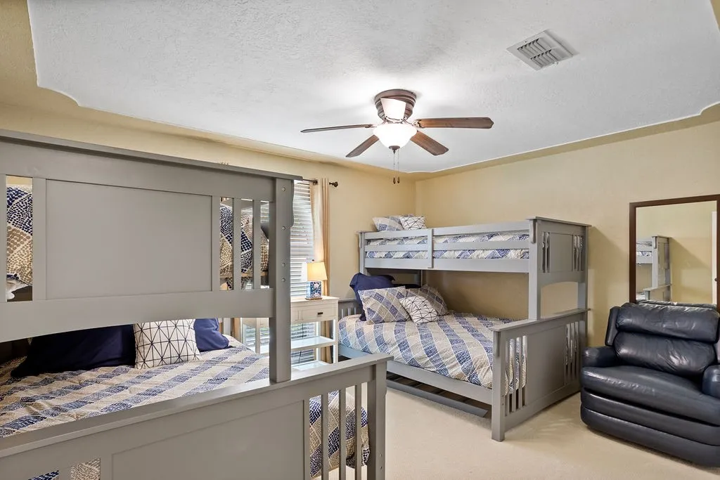 Large secondary bedroom accommodates 2 queen size beds