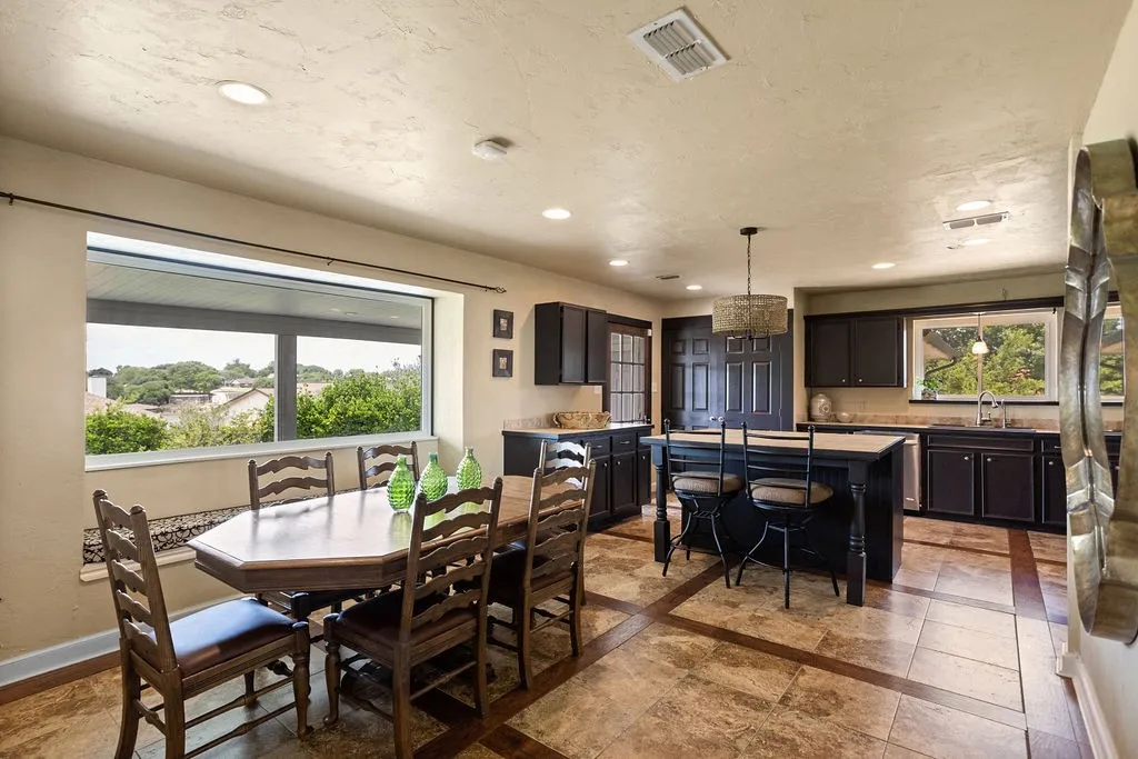 Living Area leads to spacious kitchen and dining
