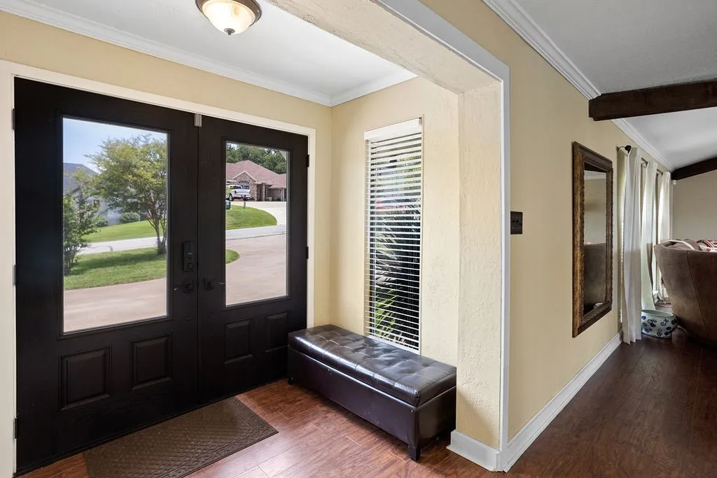 Welcoming Entry leads to spacious living area