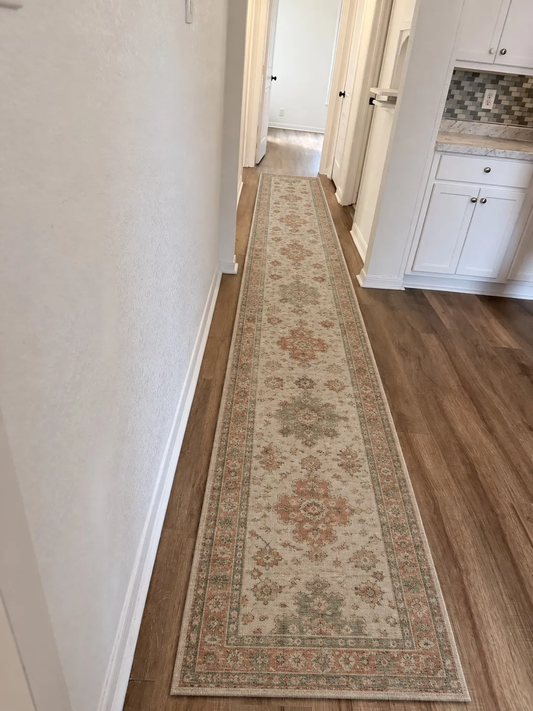 Wood-finish flooring throughout
