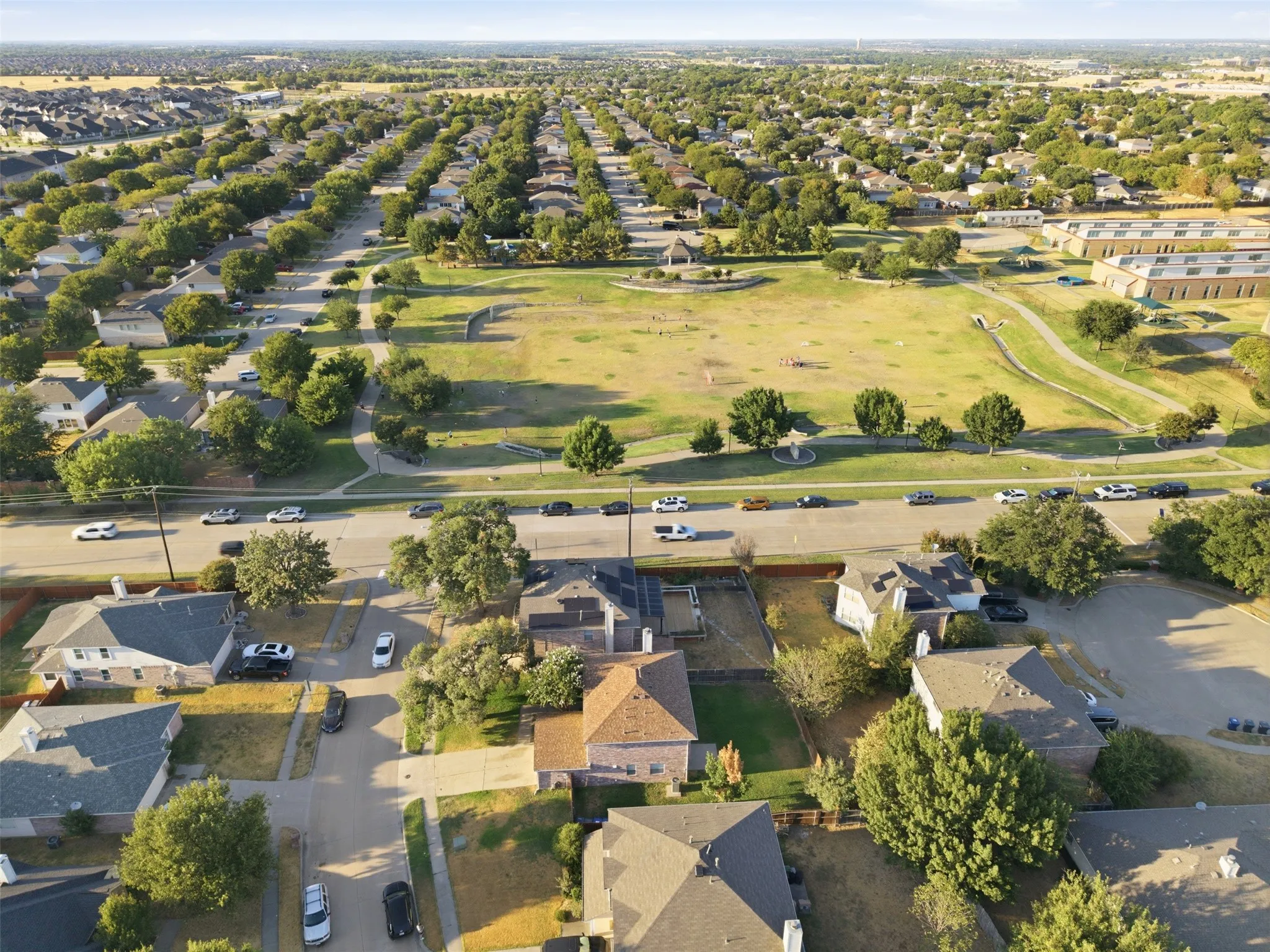 Aerial view of this home and proximity to the community park and nearby school.