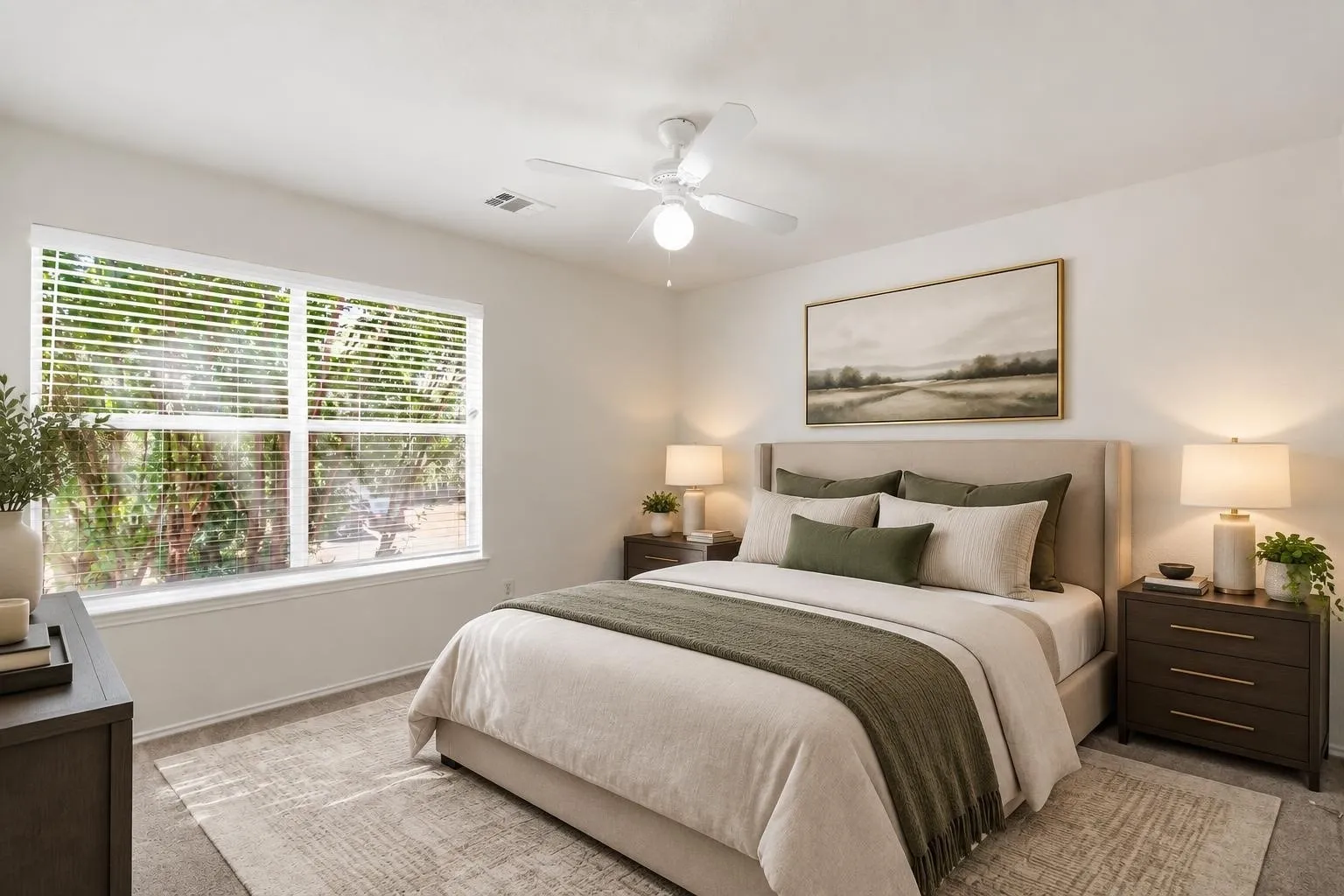 Staged photo of the large secondary bedroom