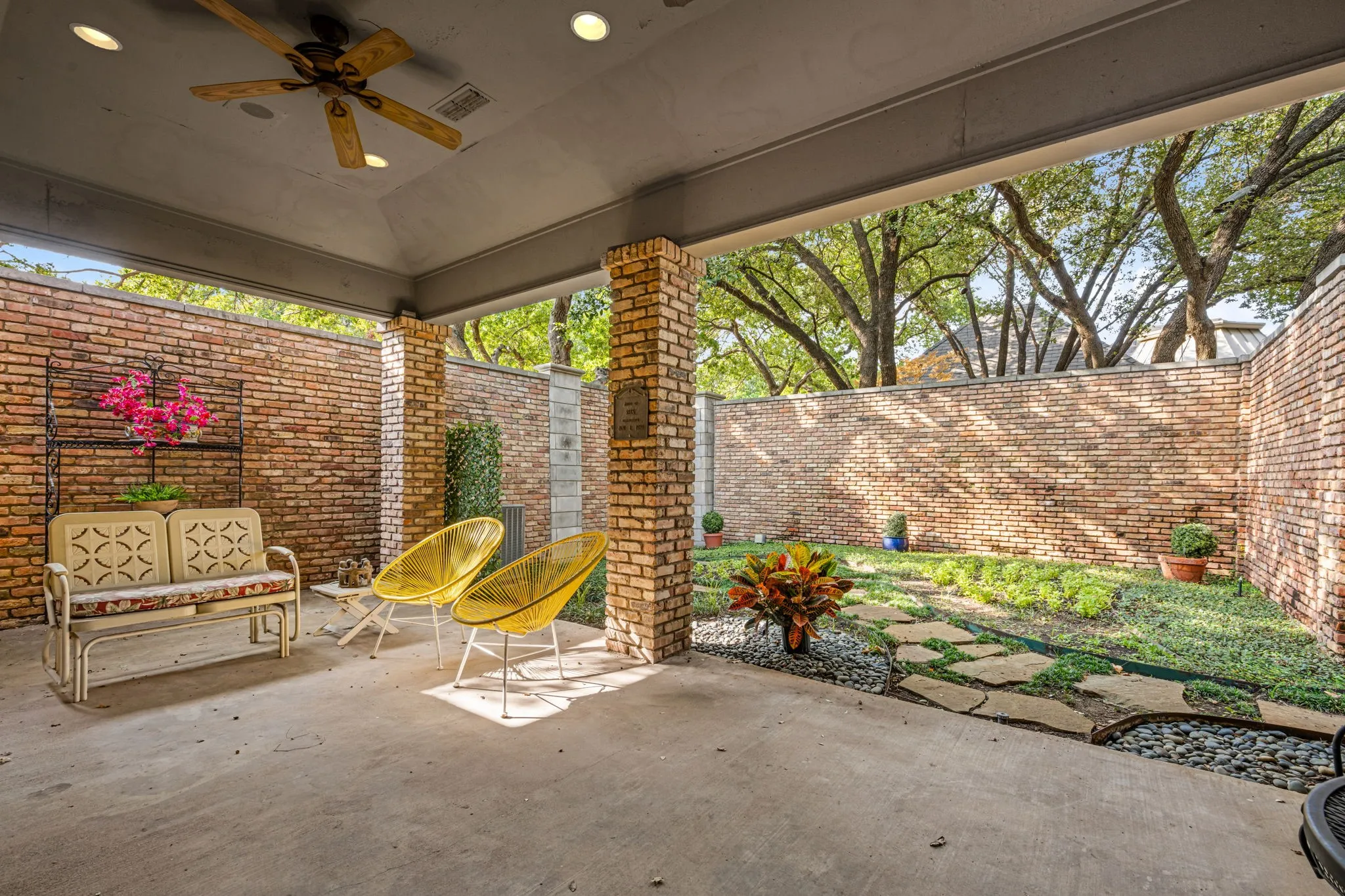 Covered patio off the kitchen with recessed lighting, and a ceiling fan. Perfect for indoor outdoor living