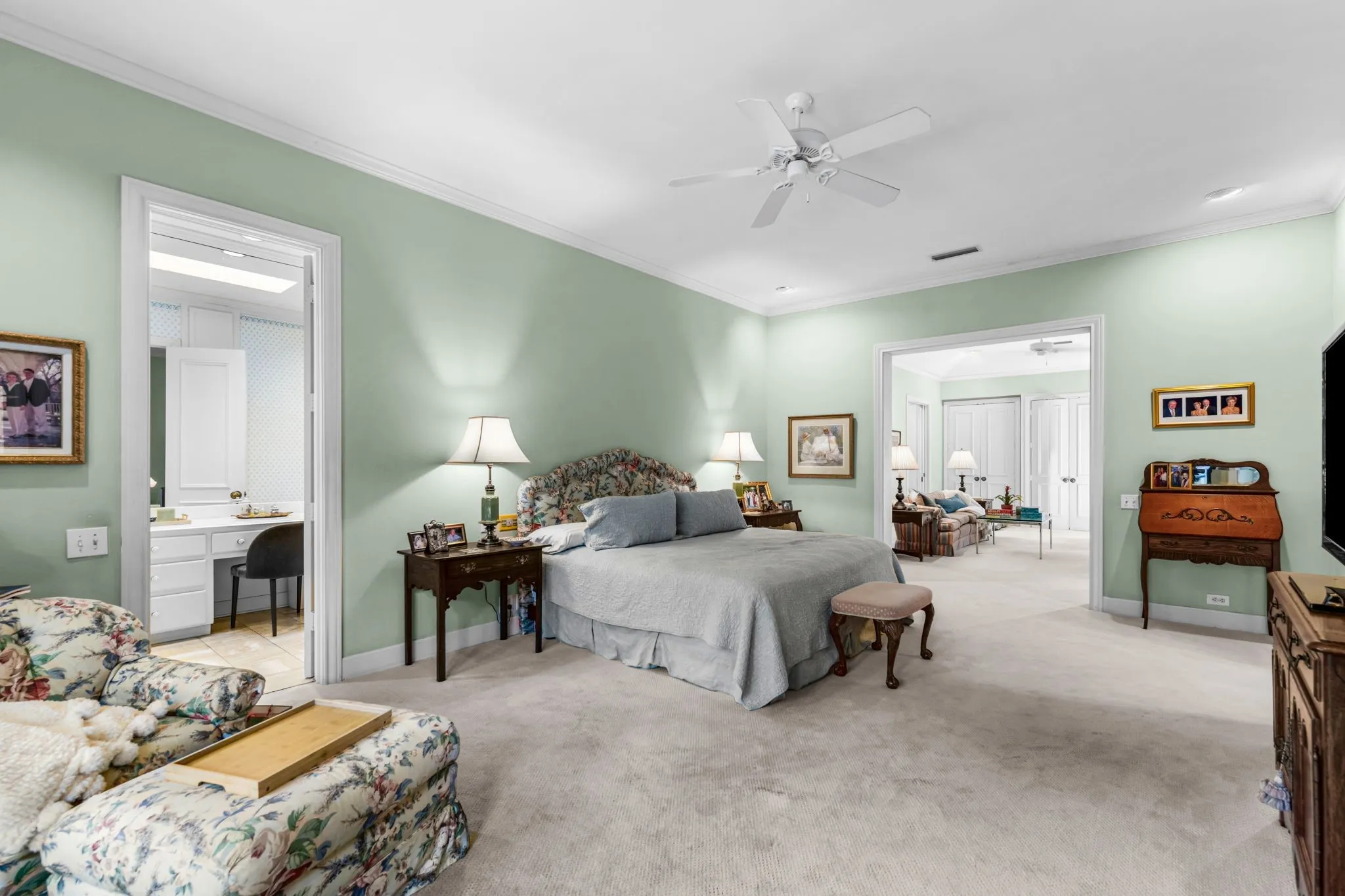 Carpeted flooring, recessed lighting, and crown molding