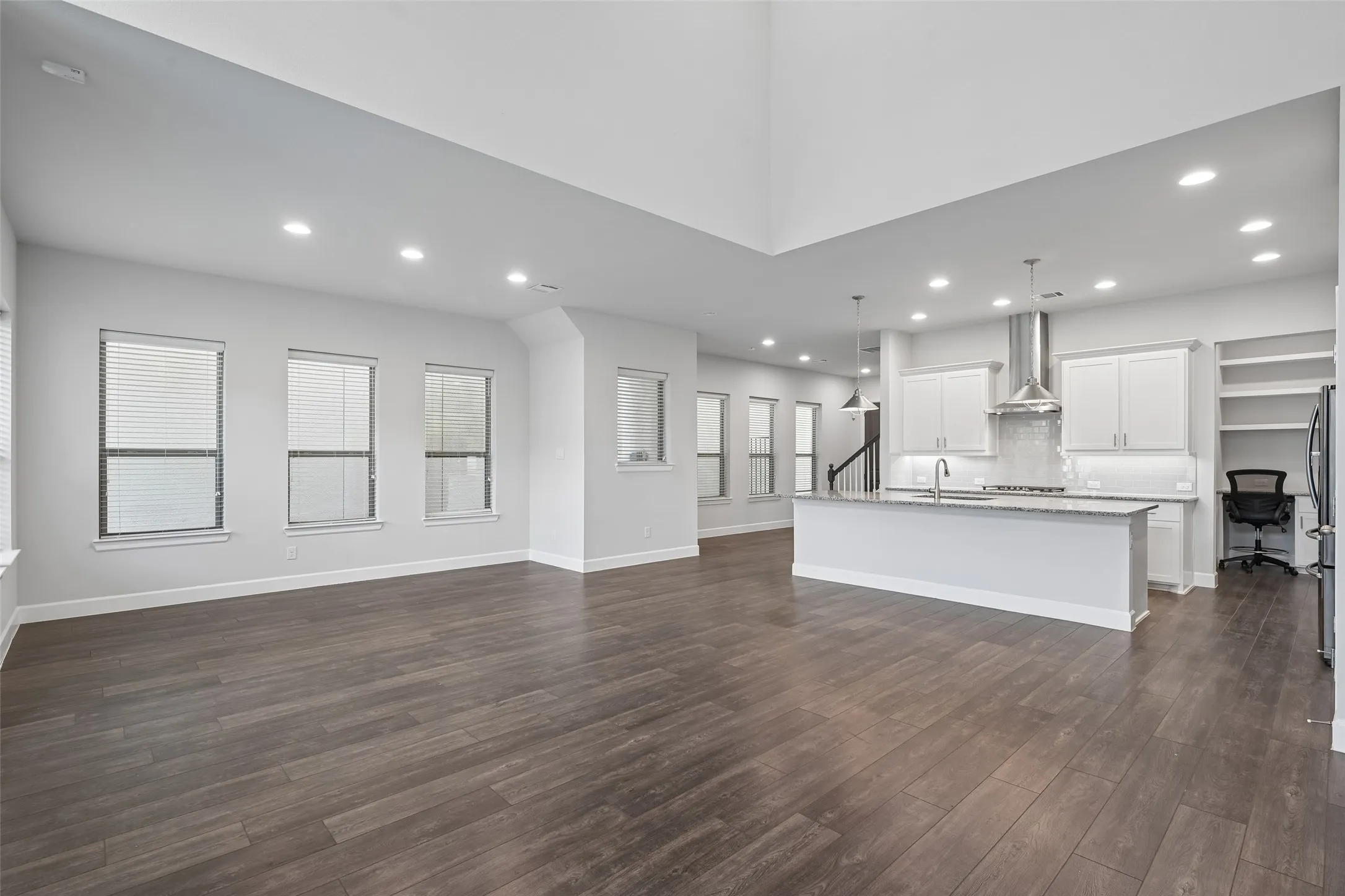 Open floor plan with multiple dining areas