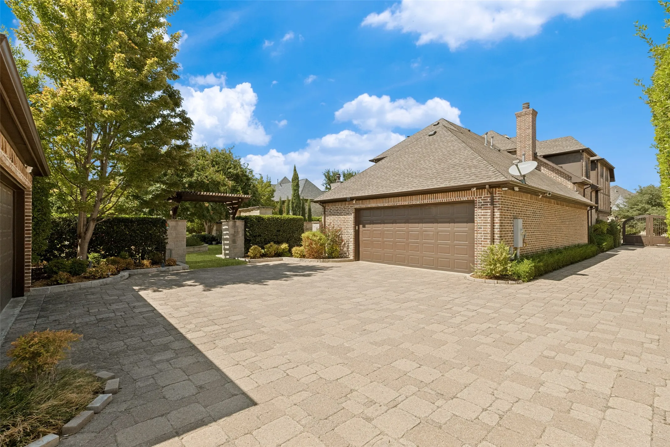 Gated driveway with courtyard area