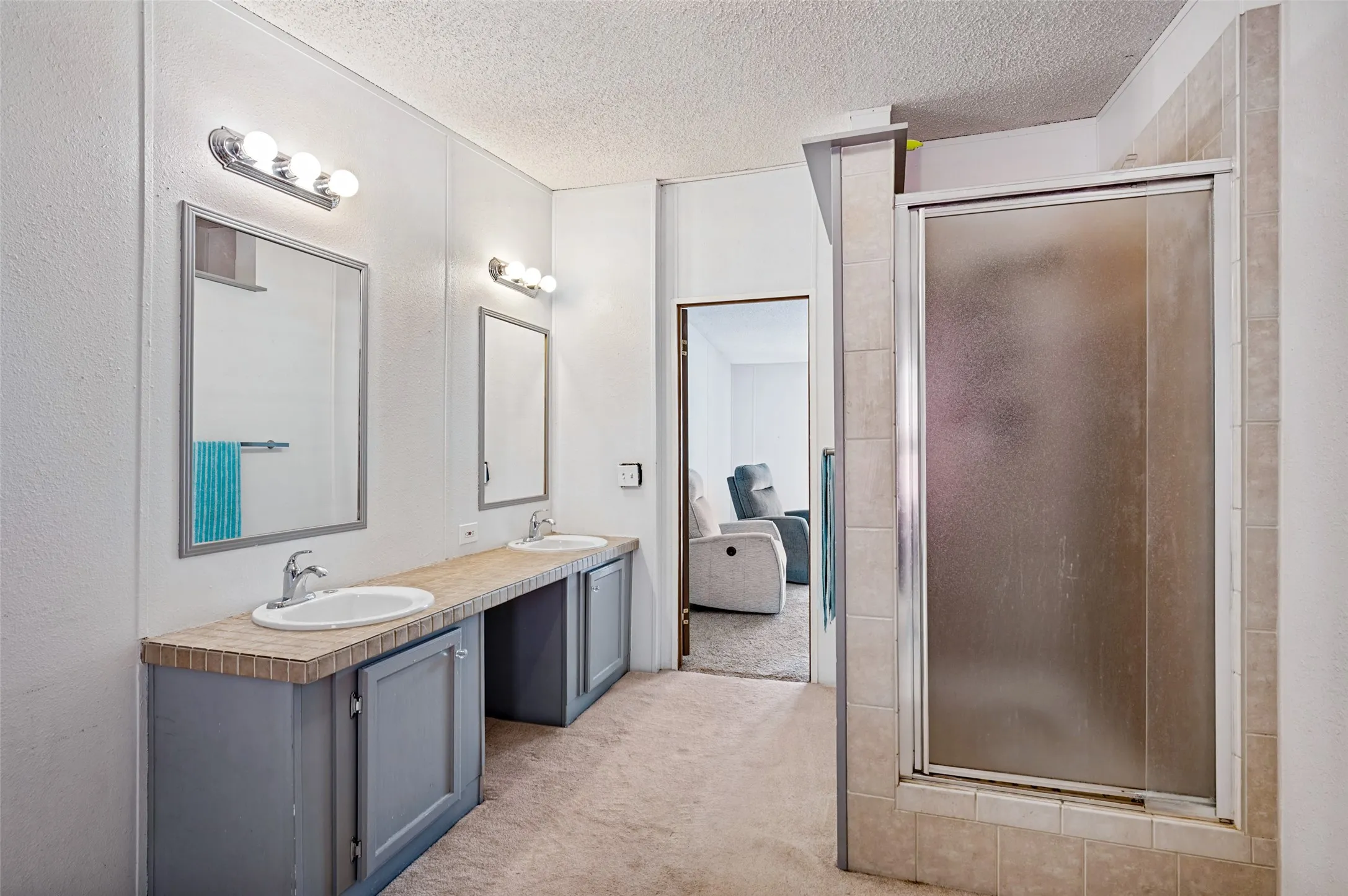 Primary bathroom with separate shower.