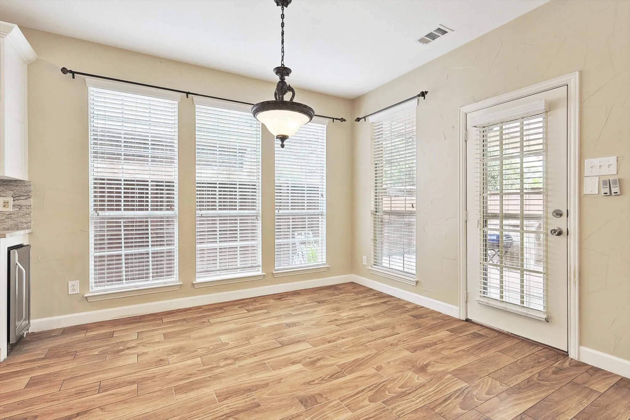 The spacious breakfast nook is perfect for family meals. Tucked next to the gourmet kitchen, this is the perfect place for many family moments.