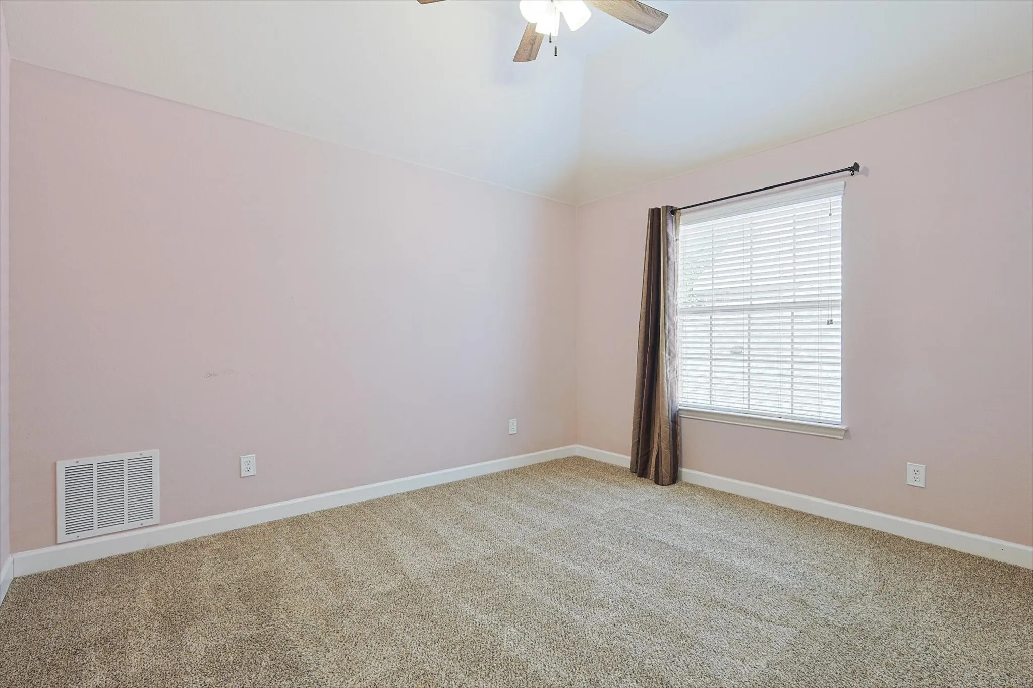 The secondary bedrooms are generously sized, each with their own design features.
