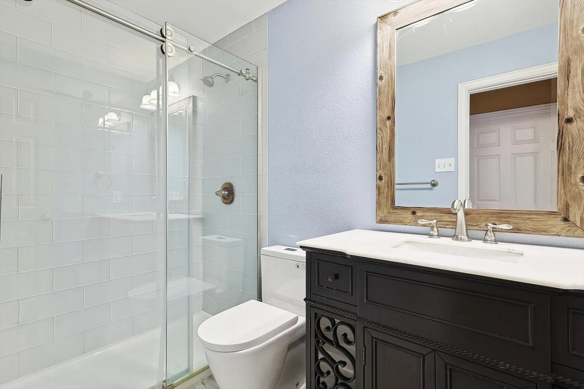 The secondary bathrooms are well appointed.