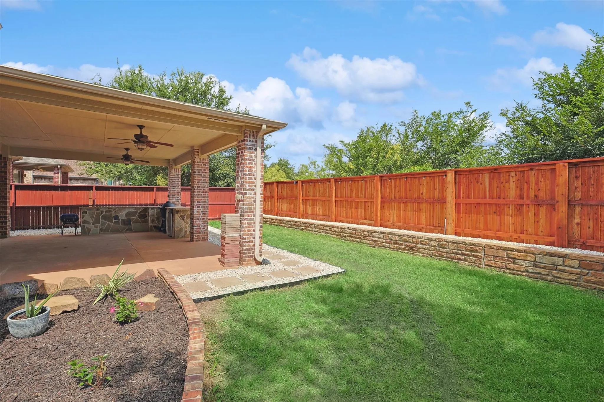 A view of the backyard and patio.