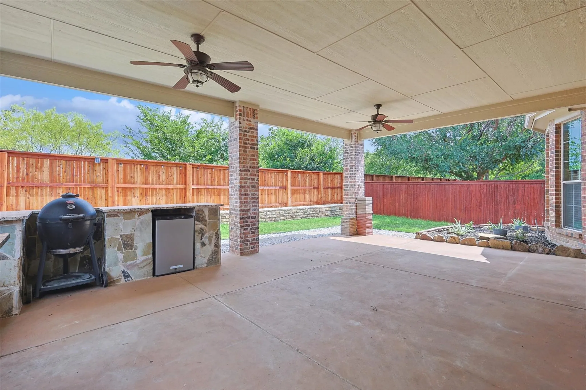 The extended patio boasts boasts plenty of space for outdoor fun.