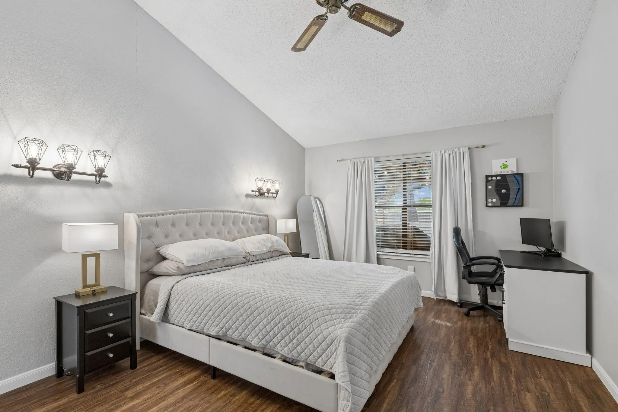 Primary bathroom with tall ceilings and ensuite bathroom