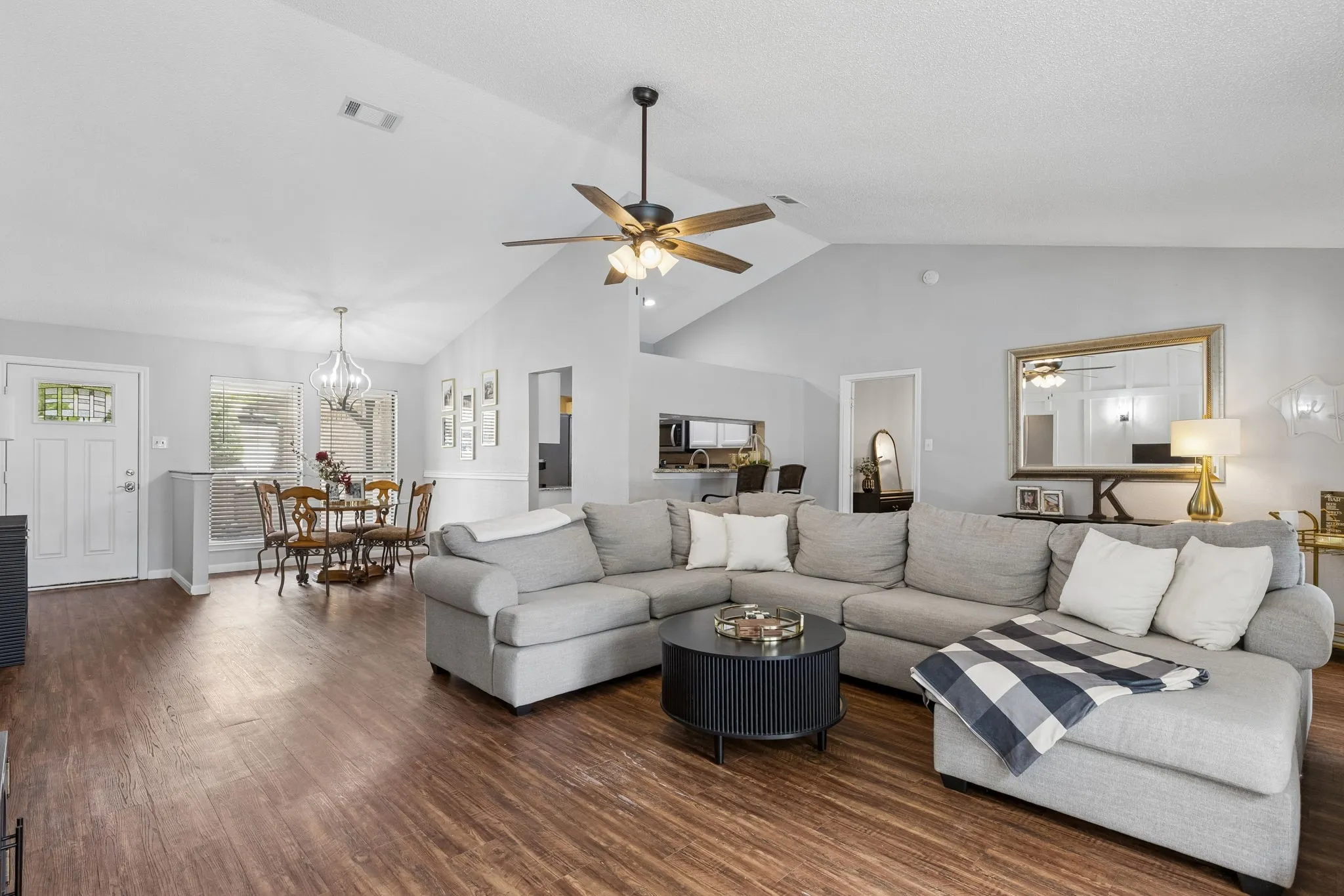 Living room with view of dining area and kitchen