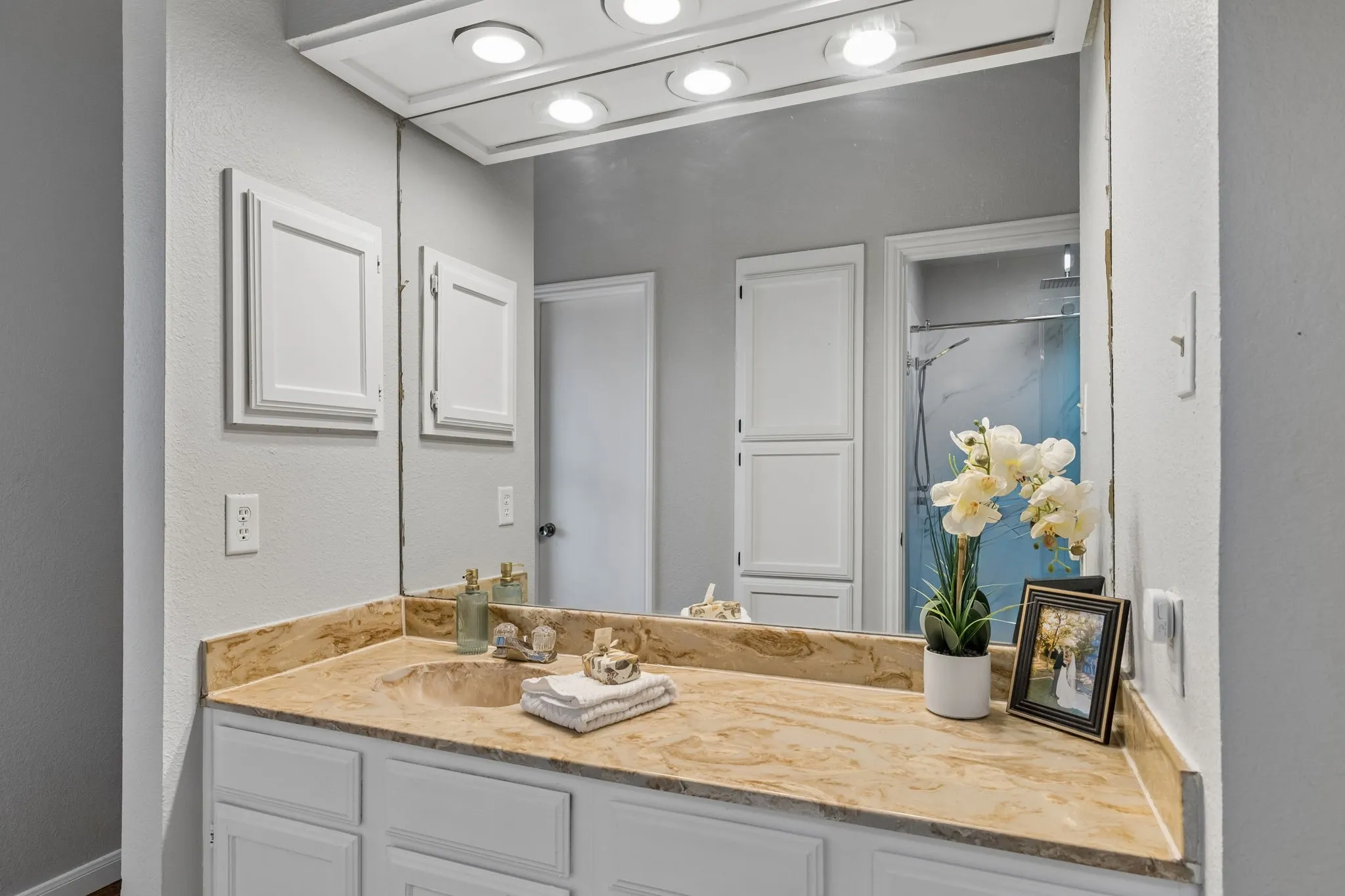 Primary bathroom vanity view 2