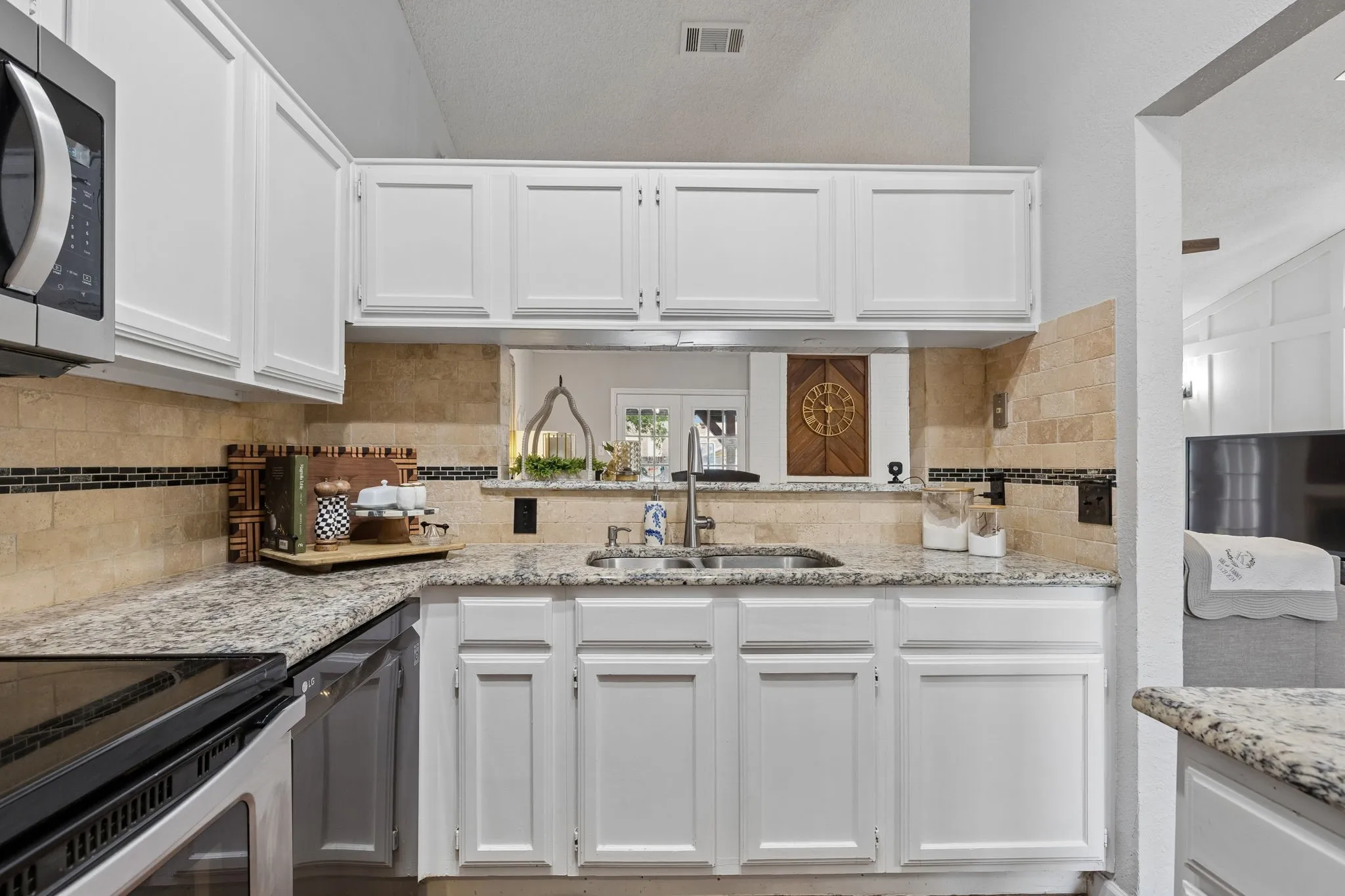 Kitchen with view of "eat in bar"