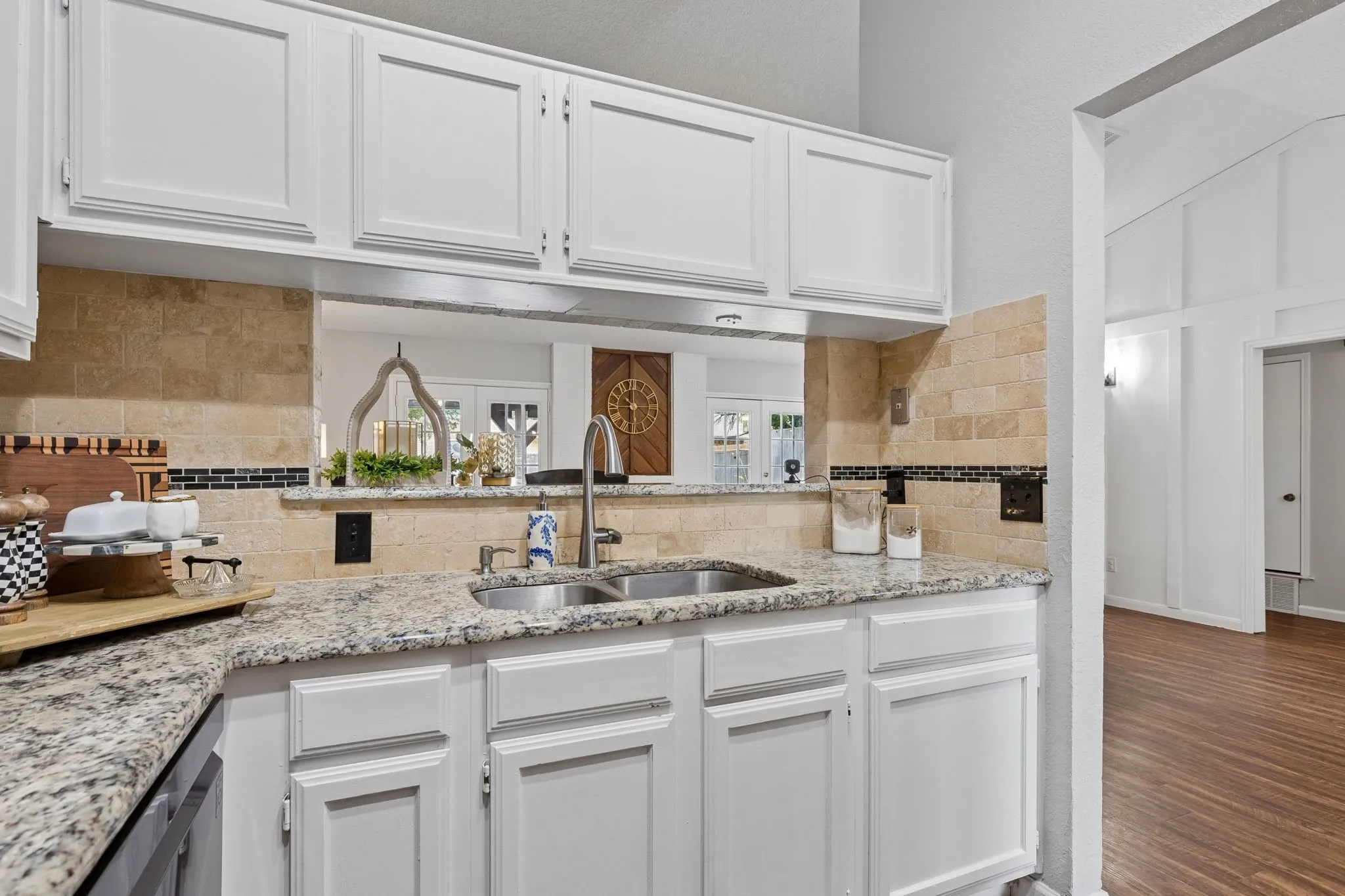 Kitchen that opens to dining area and living room