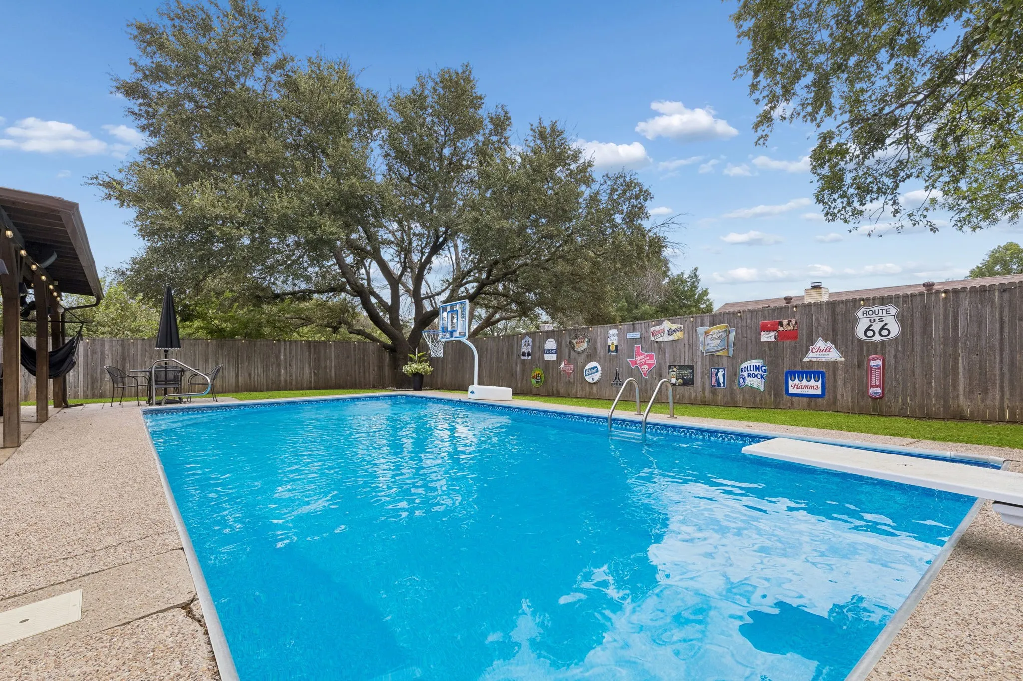 Chlorine pool with view of lush landscaping