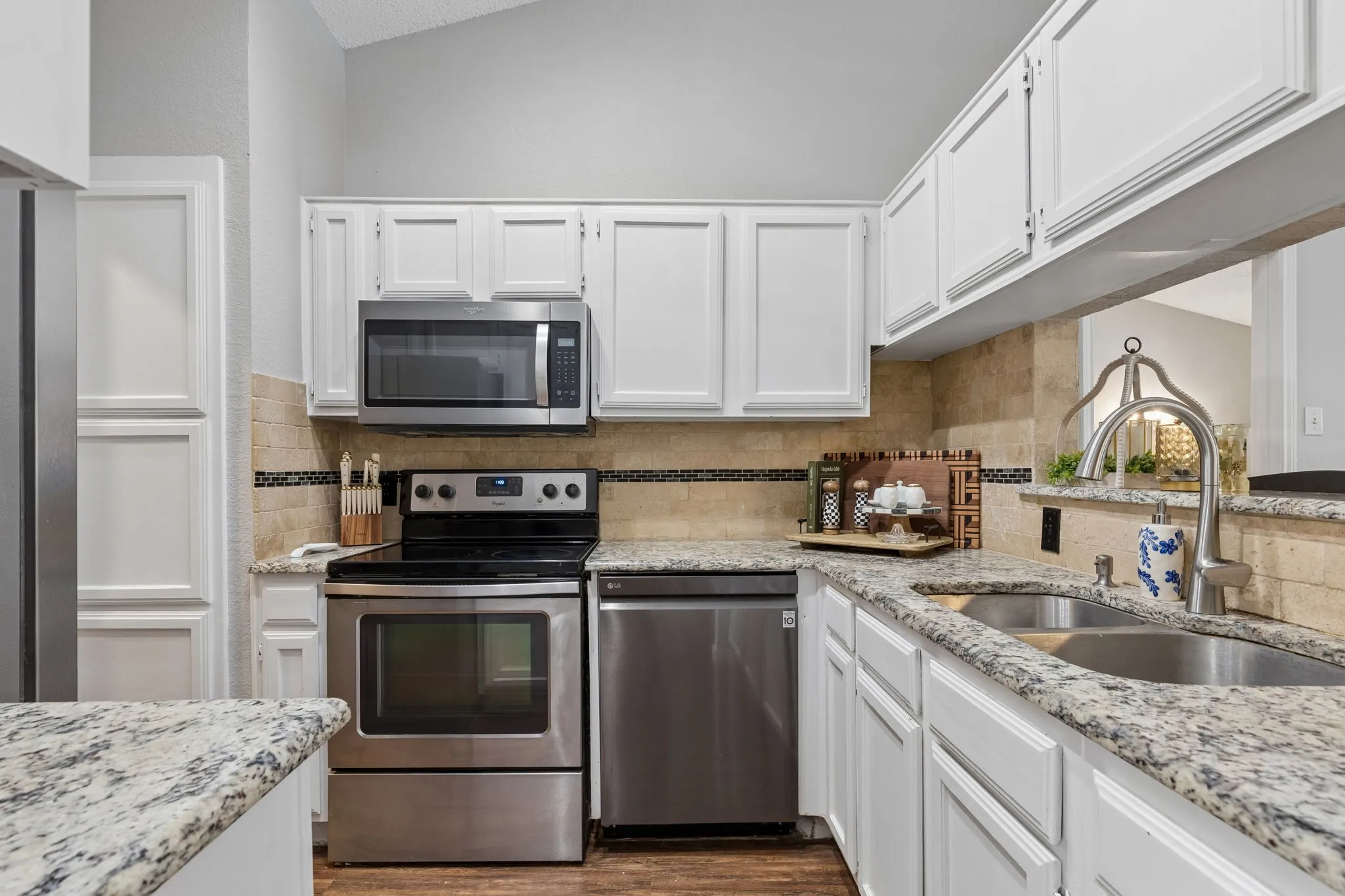 Kitchen with fresh paint and stainless steel appliances