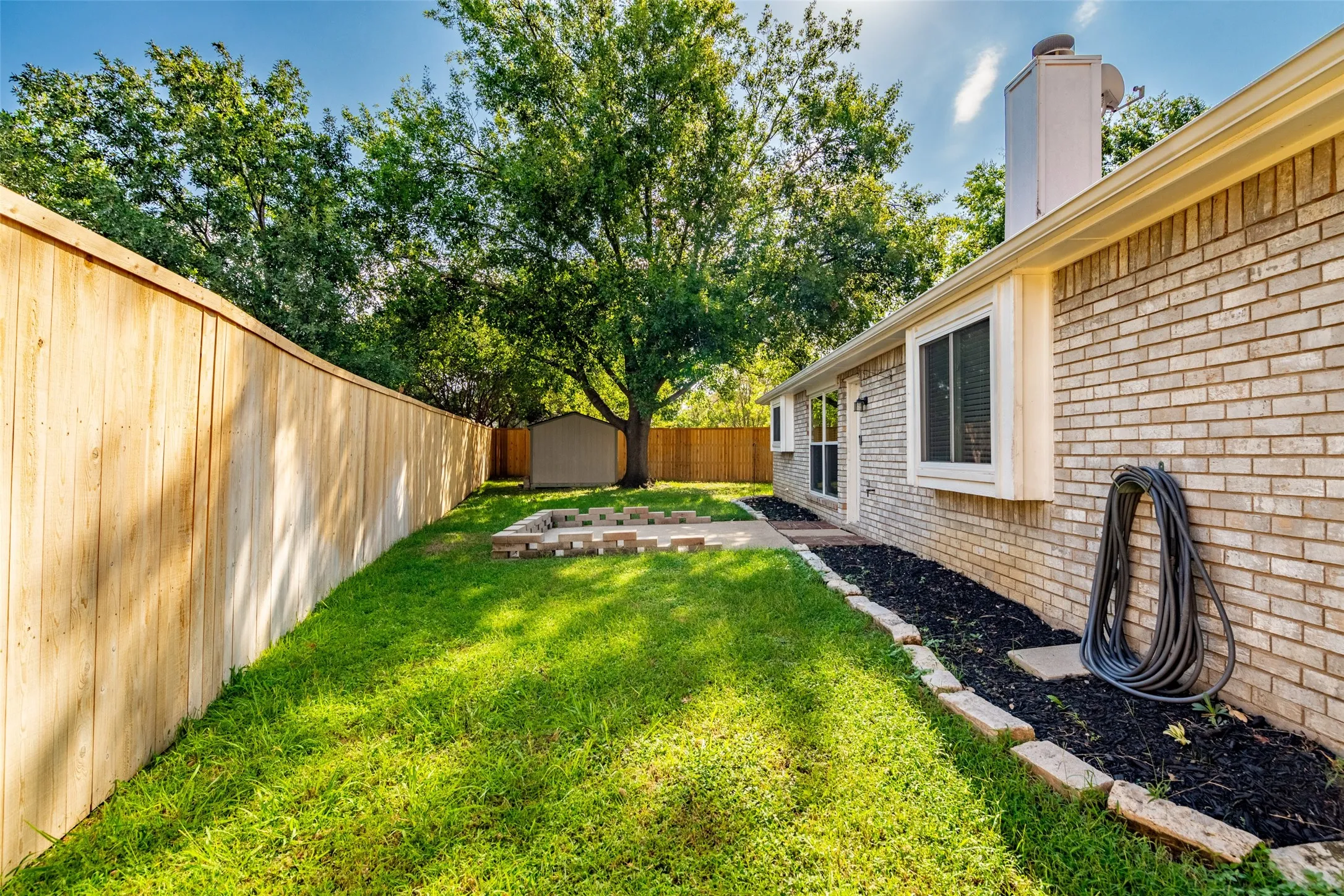 Brick exterior with white window trim