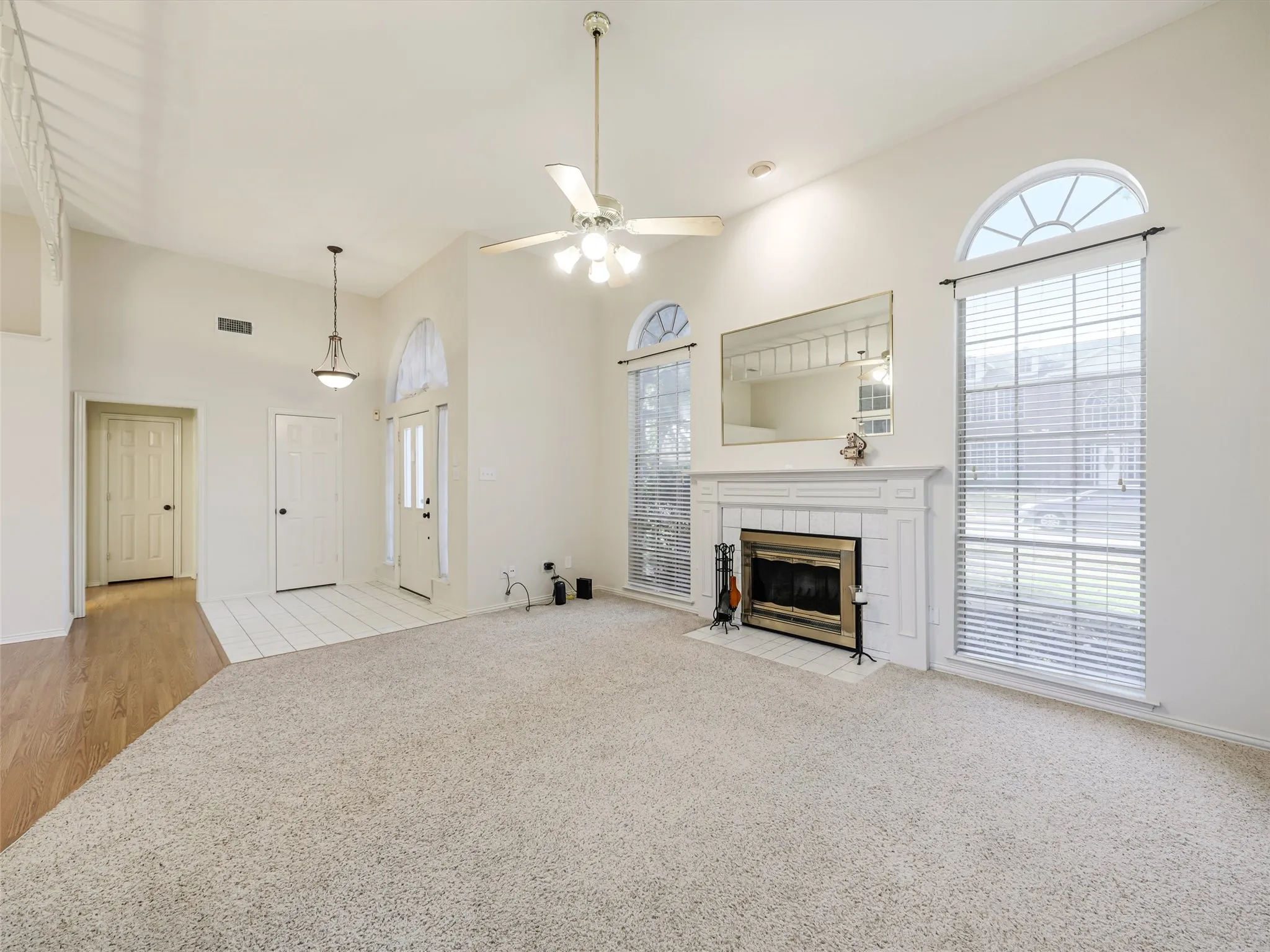 Vaulted ceilings and a ceiling fan with integrated lighting